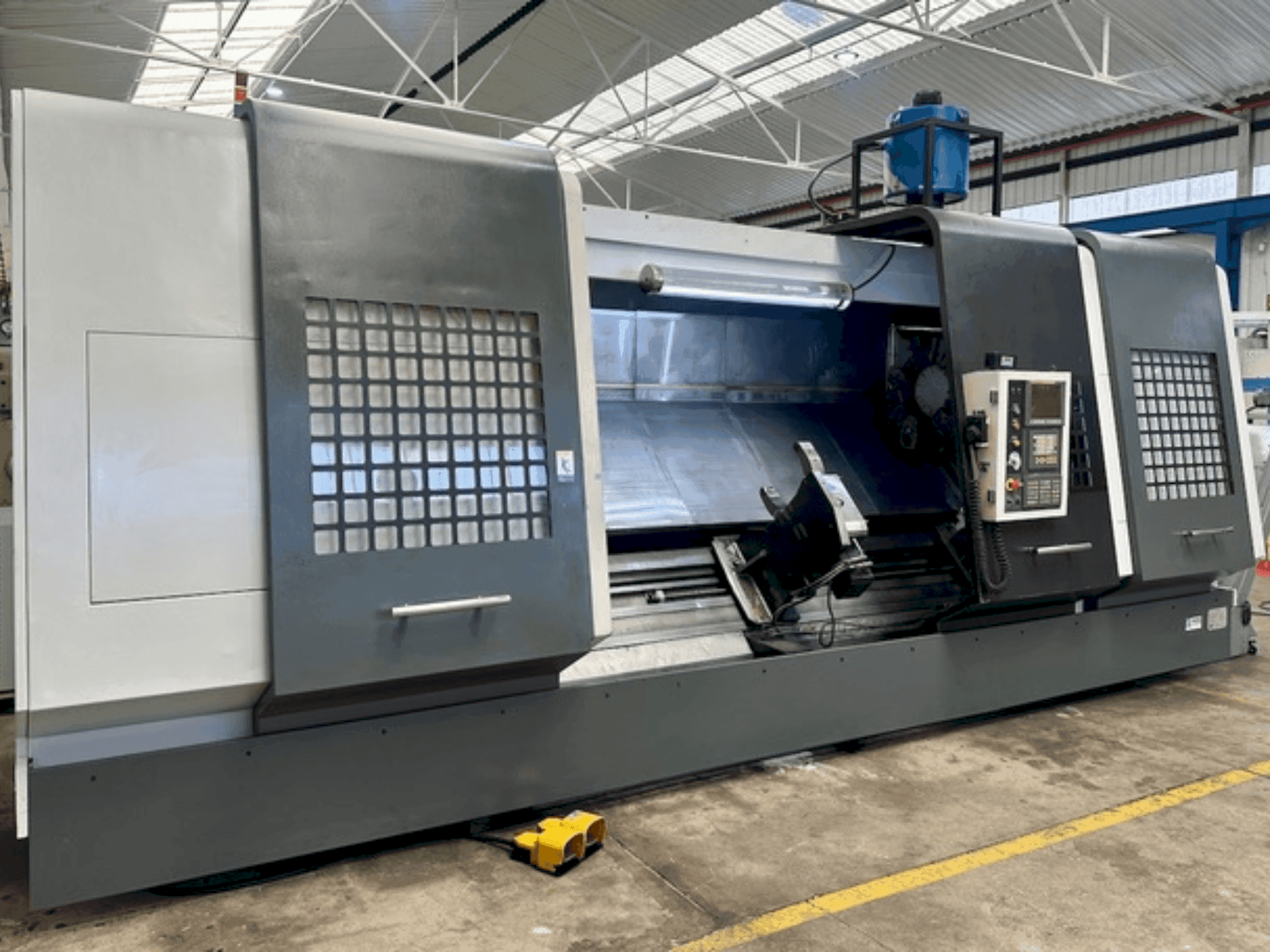 Mašīnas SMTCL HTC 63300  pretskats