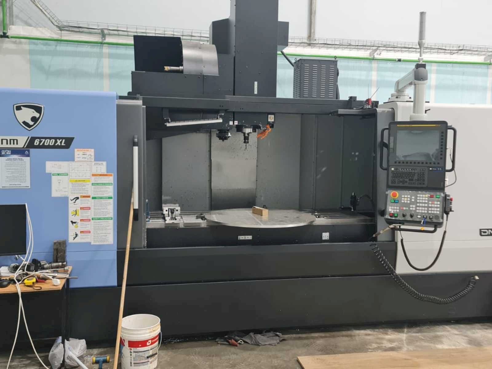 Mašīnas Doosan DNM 6700 XL  pretskats