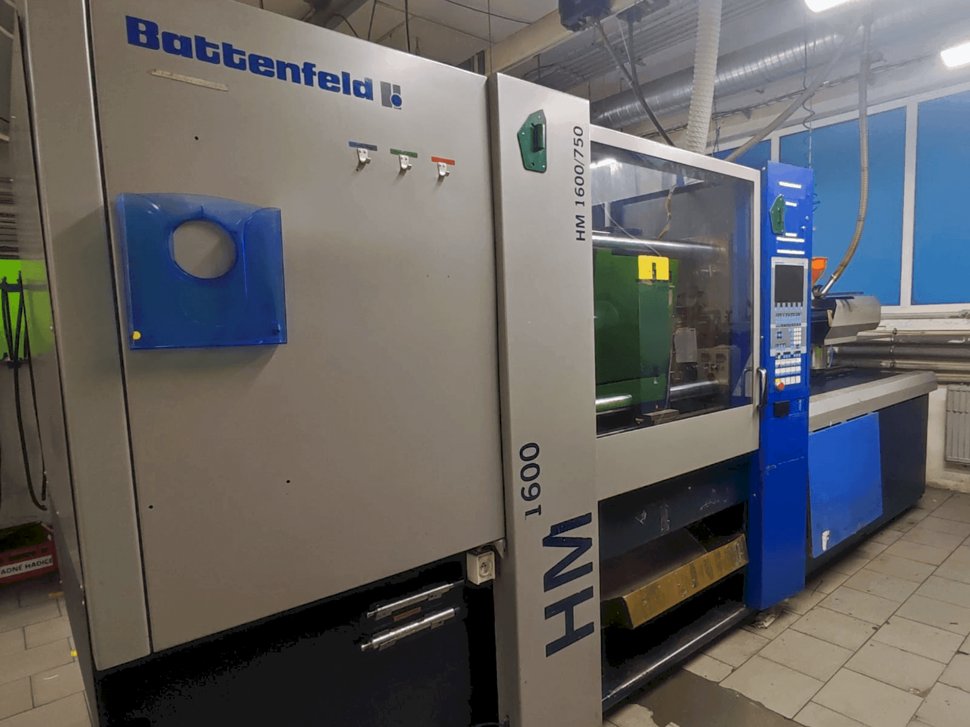 Mašīnas Battenfeld HM 1600/750  pretskats