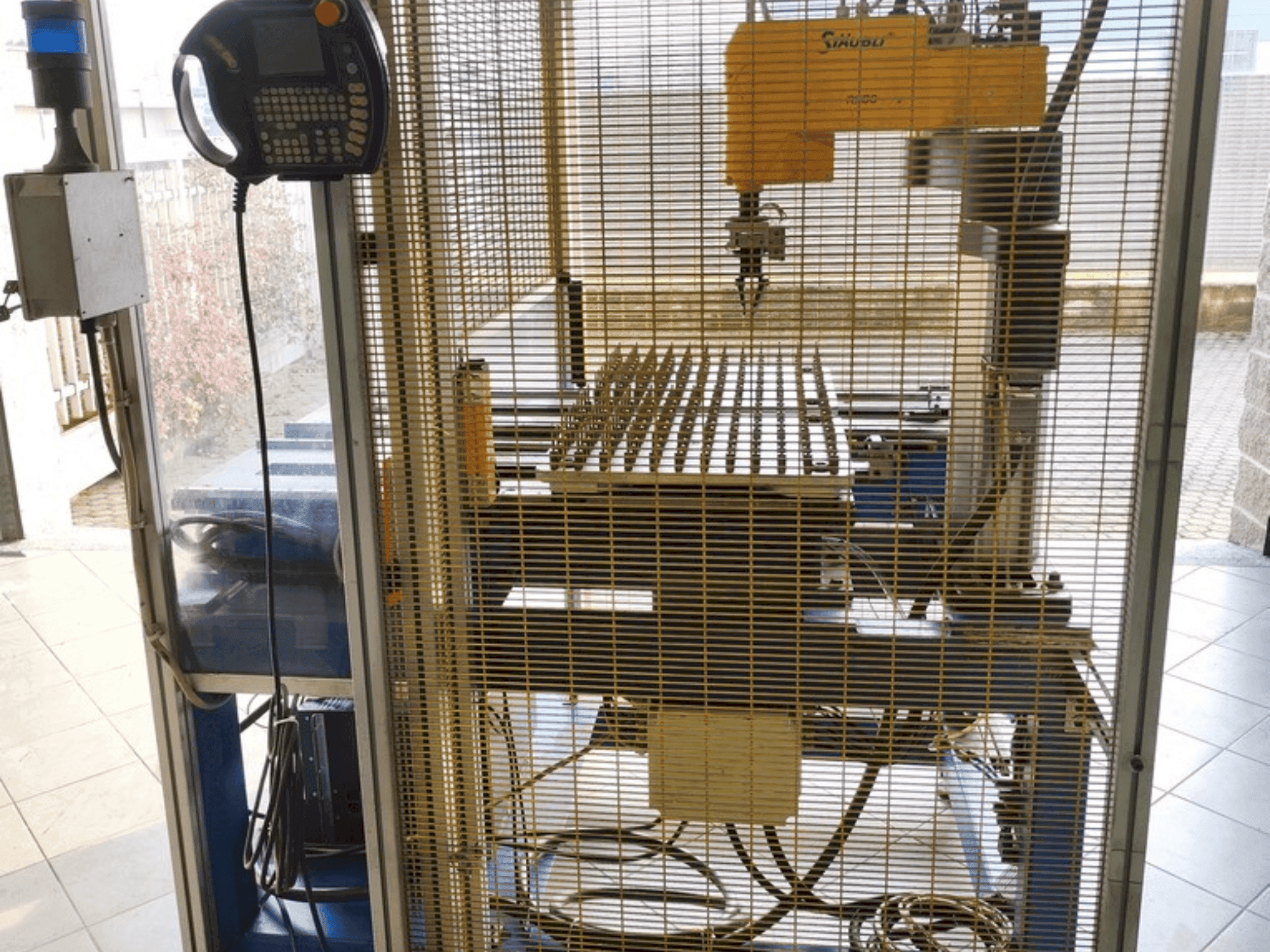 Mašīnas STAUBLI RS80  pretskats