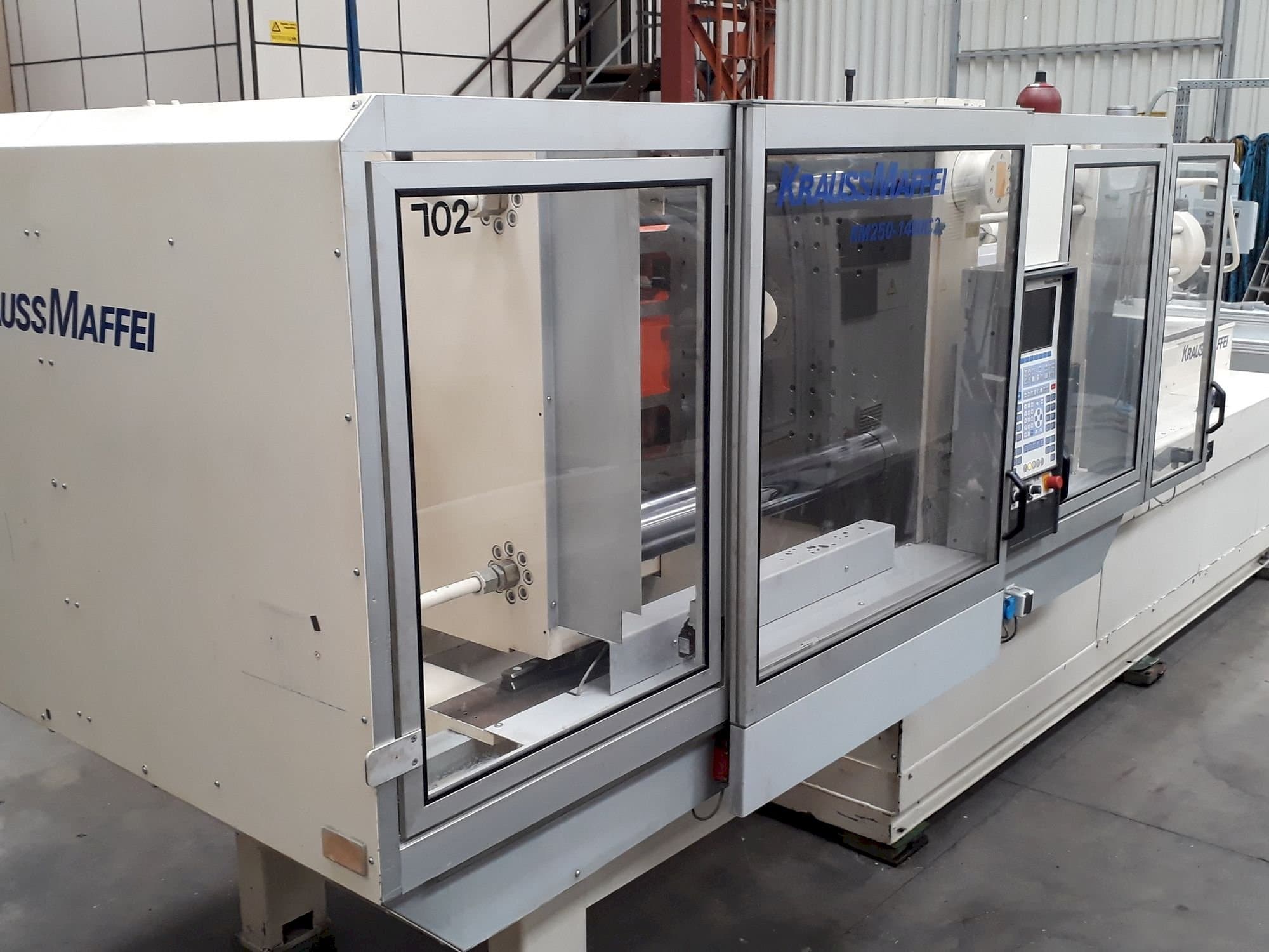Mašīnas Krauss Maffei 250-1400 C2  pretskats