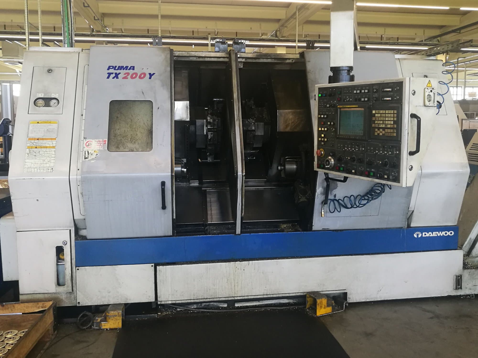 Mašīnas DAEWOO PUMA TX200Y  pretskats