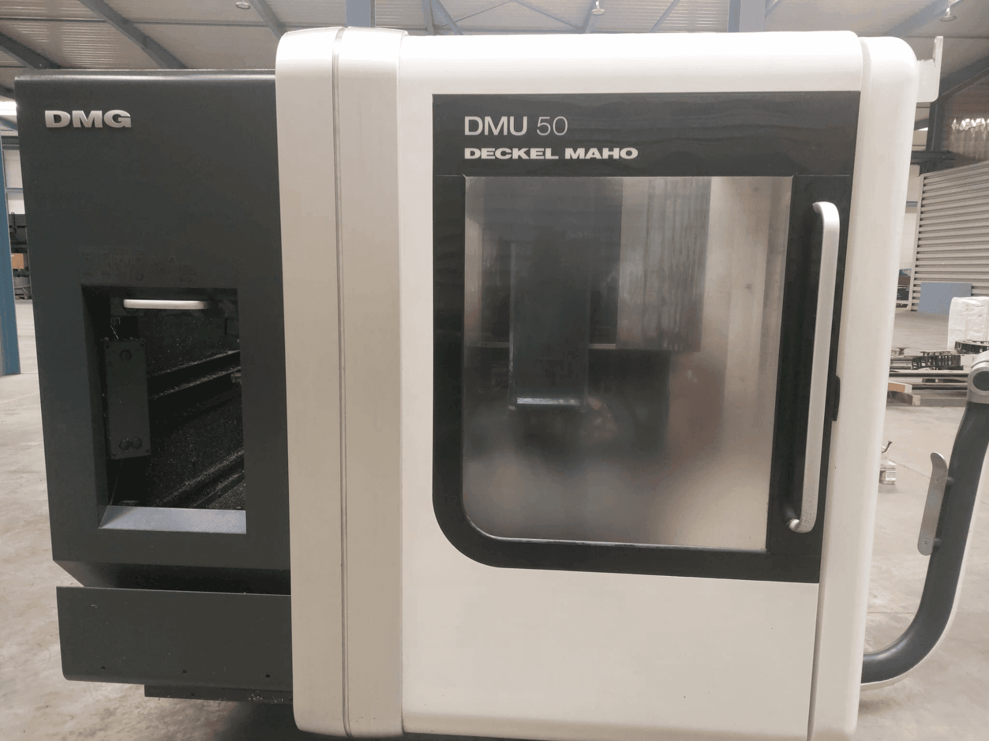 Mašīnas DMG DECKEL MAHO DMU 50  pretskats