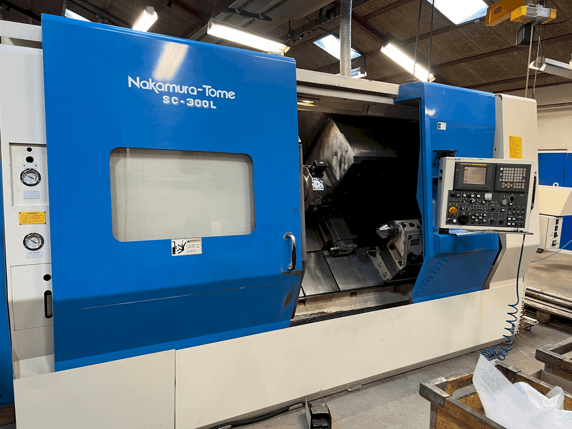 Mašīnas NAKAMURA SL 300LY  pretskats