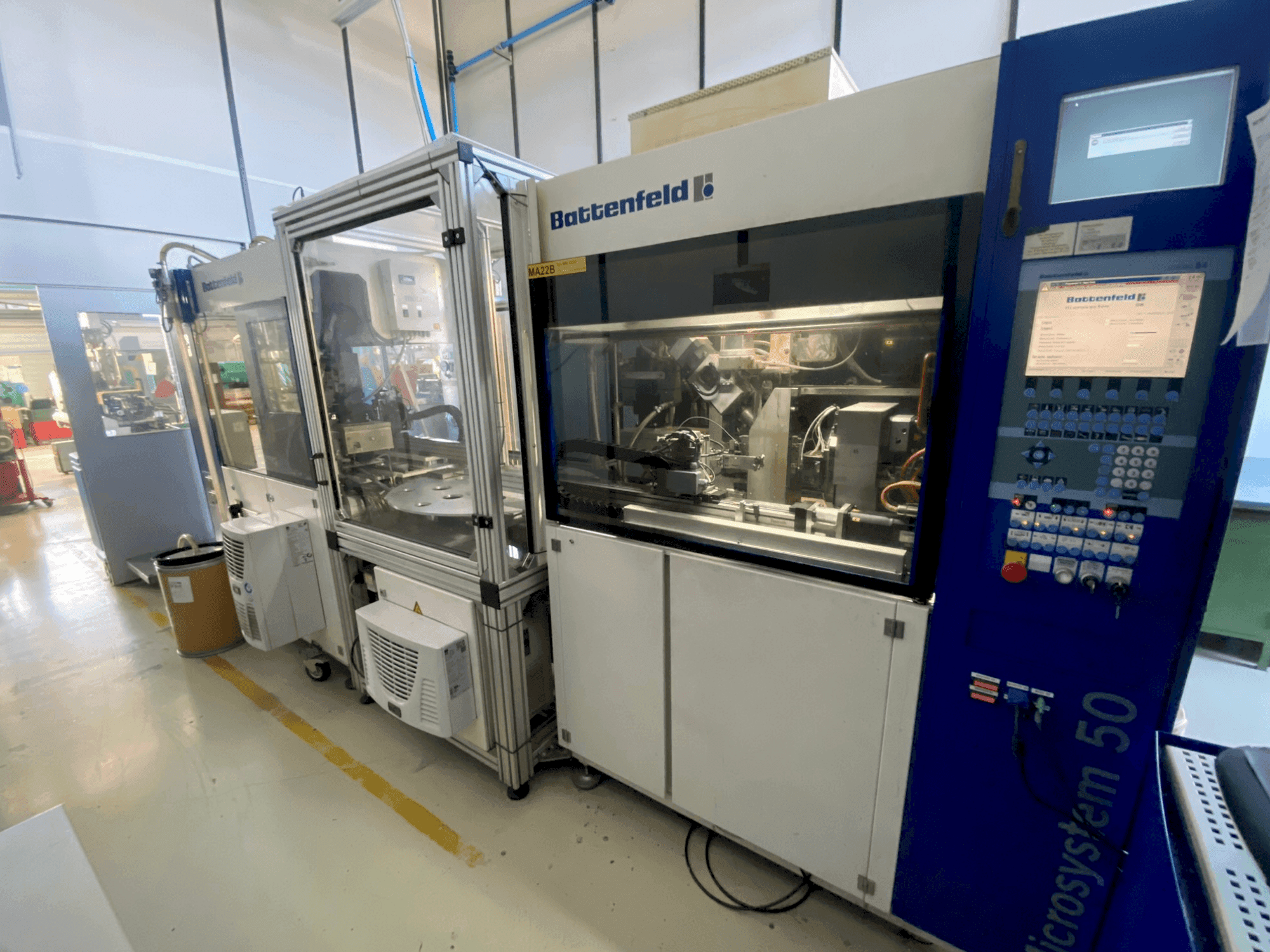 Mašīnas Battenfeld Microsystem MM 50/50  pretskats