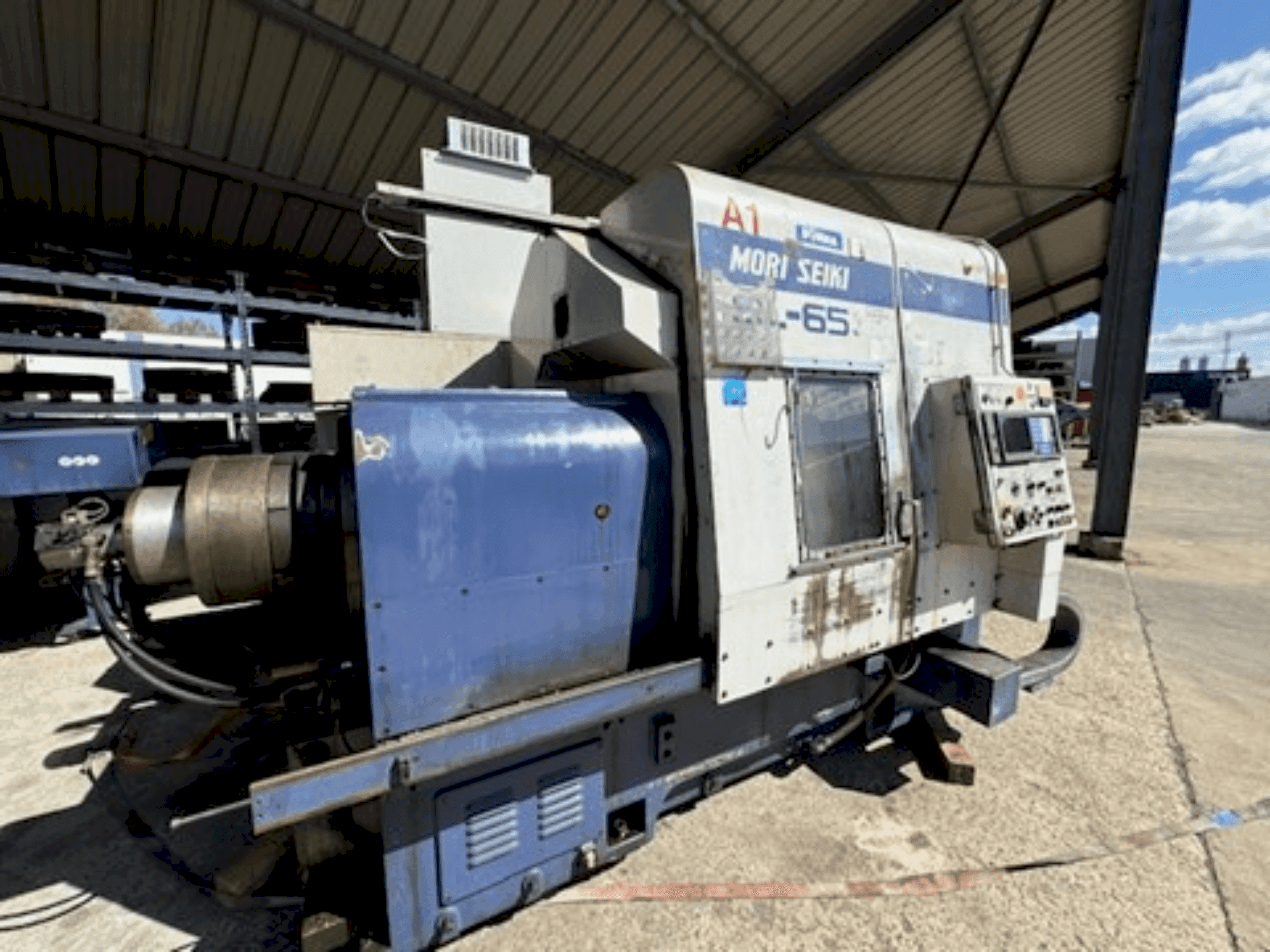 Mašīnas MORI SEIKI SL-65C  pretskats