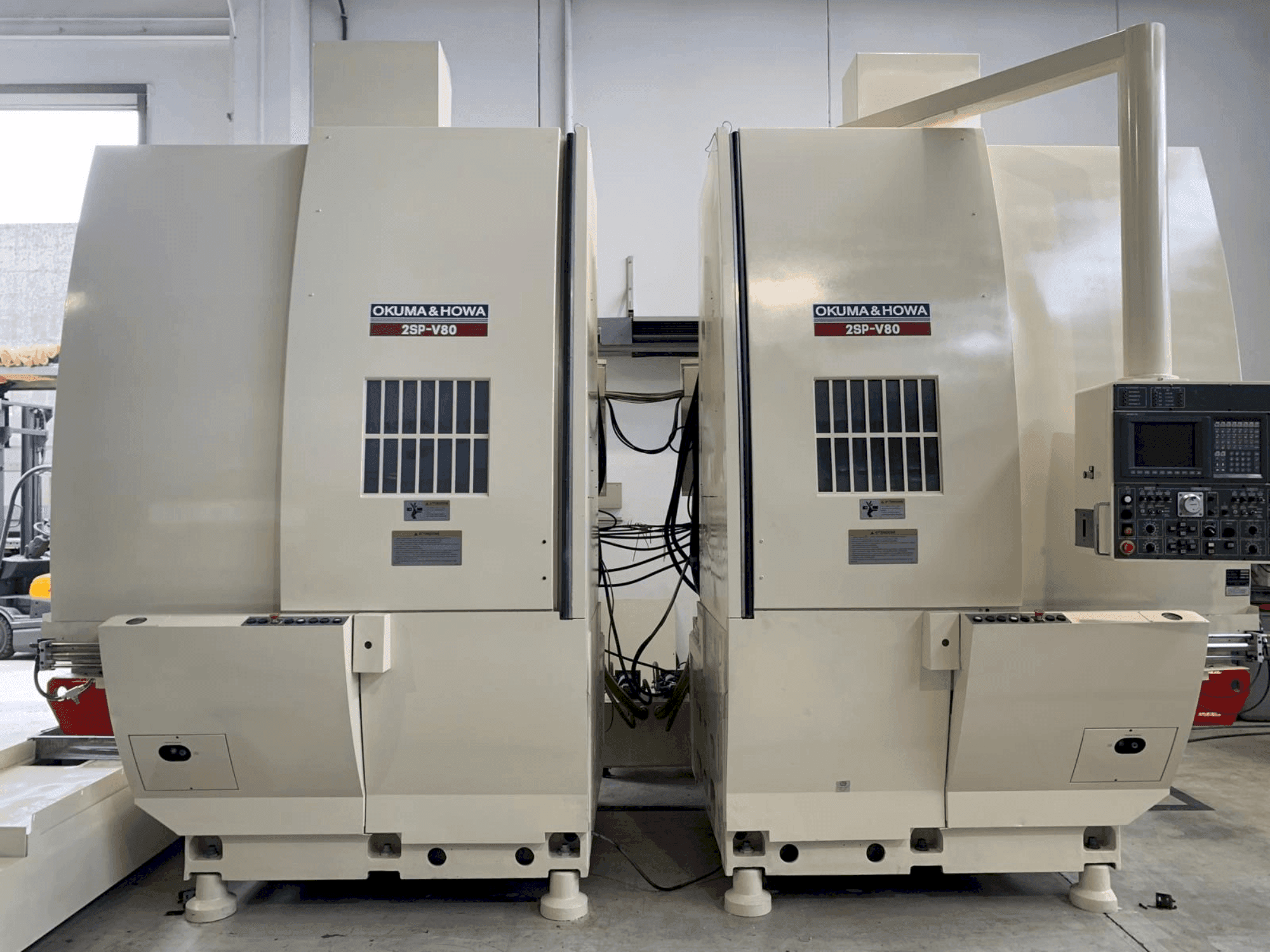 Mašīnas Okuma 2SP-V80  pretskats