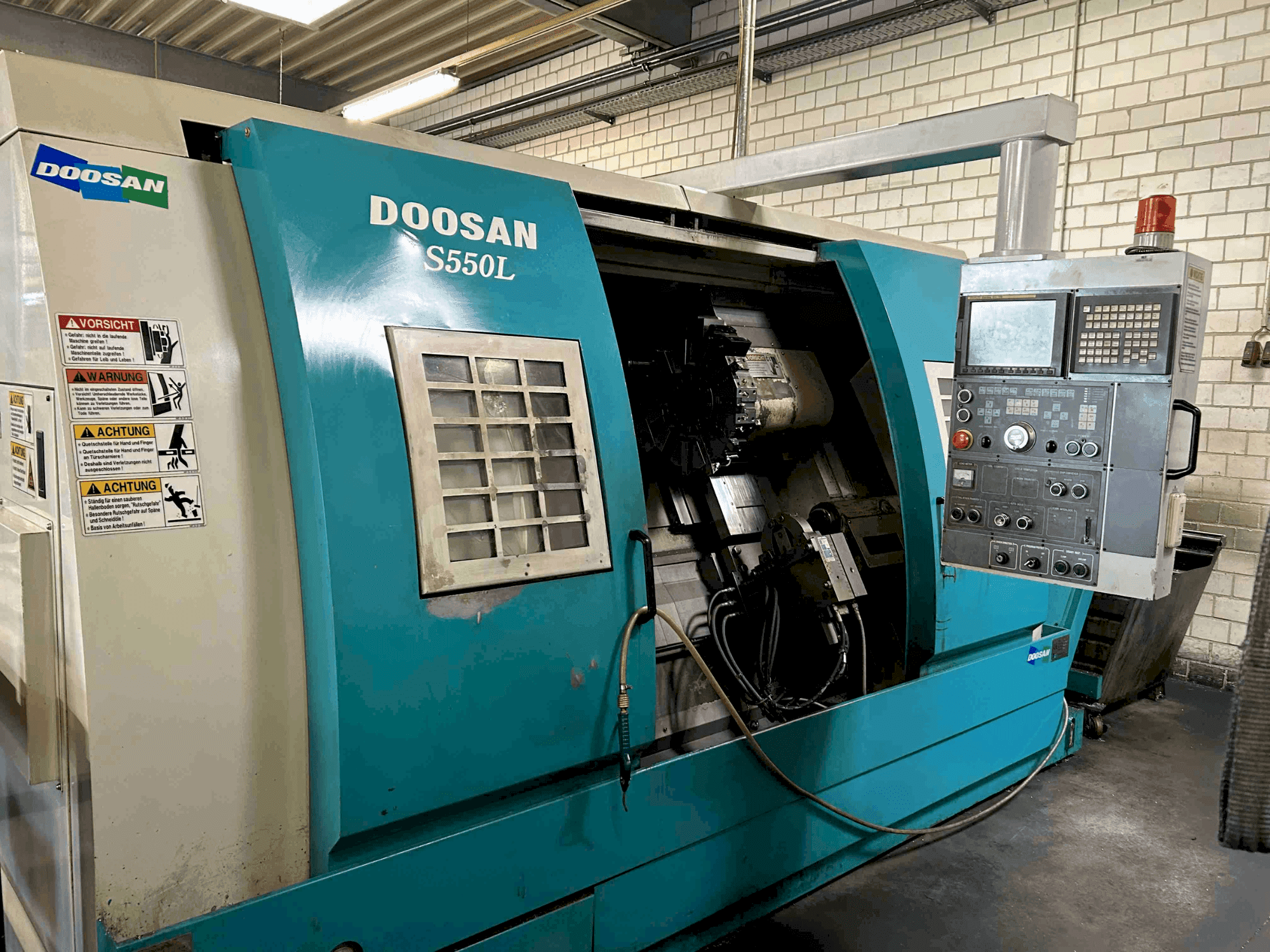 Mašīnas DOOSAN S550L  pretskats