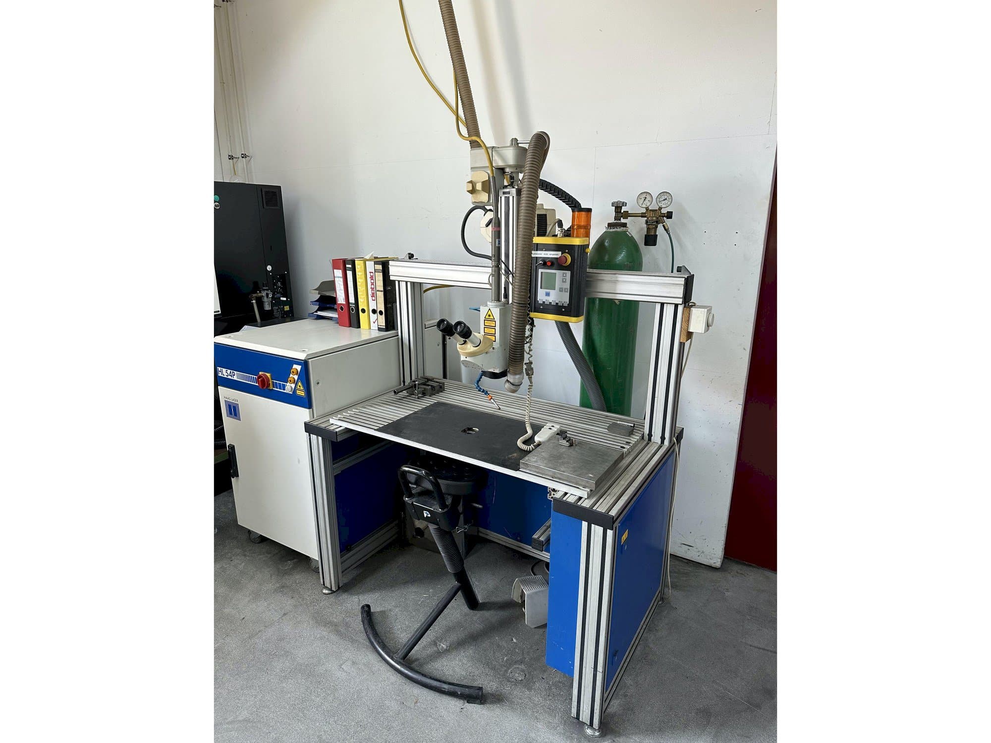 Mašīnas Haas-Laser HL 54P  pretskats