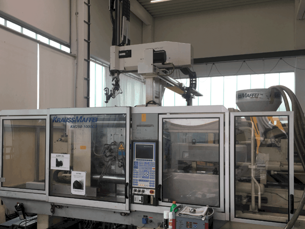 Mašīnas Krauss Maffei 250-1000 C2  pretskats