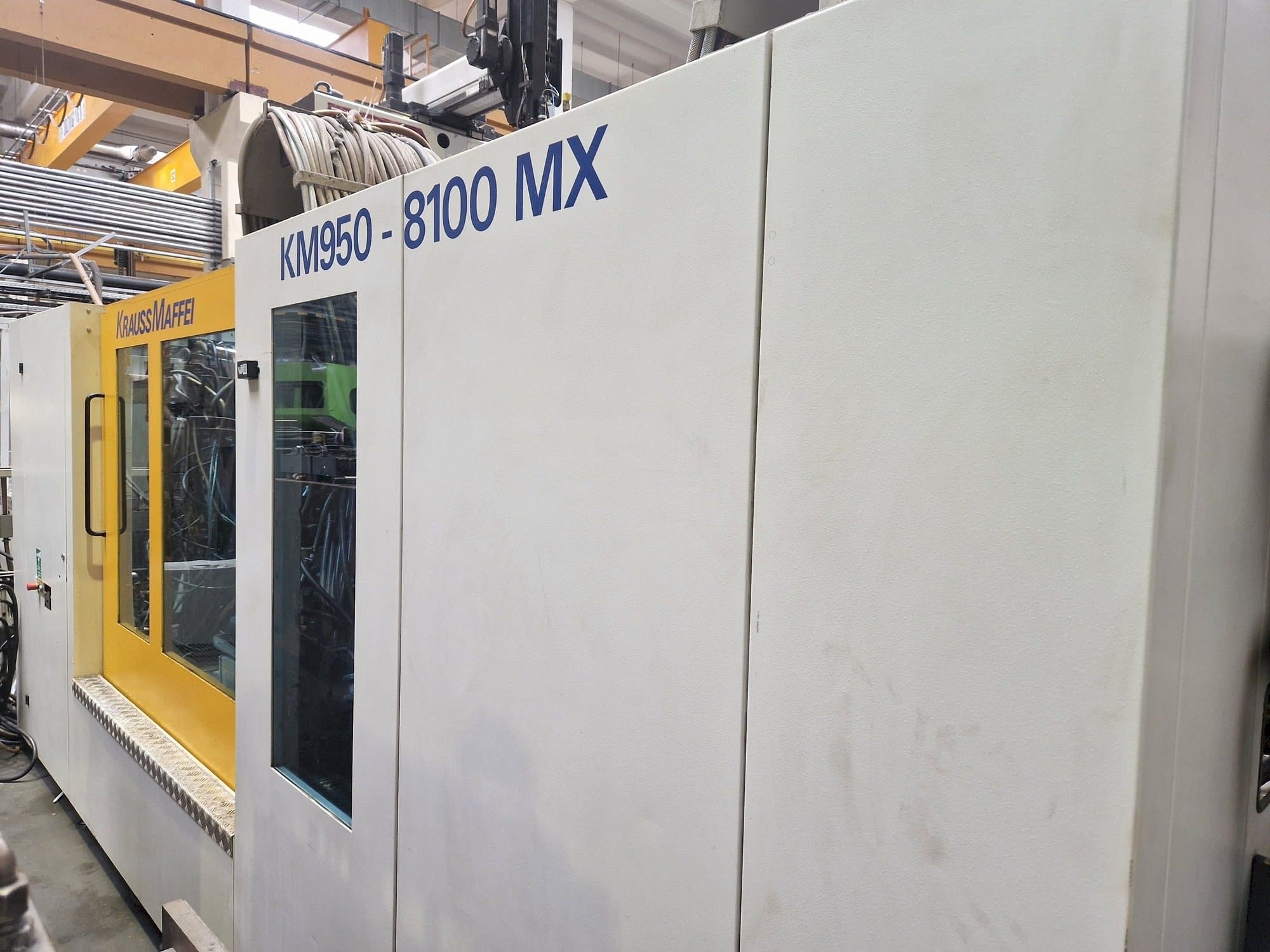 Mašīnas Krauss Maffei 950-8100 MX  pretskats