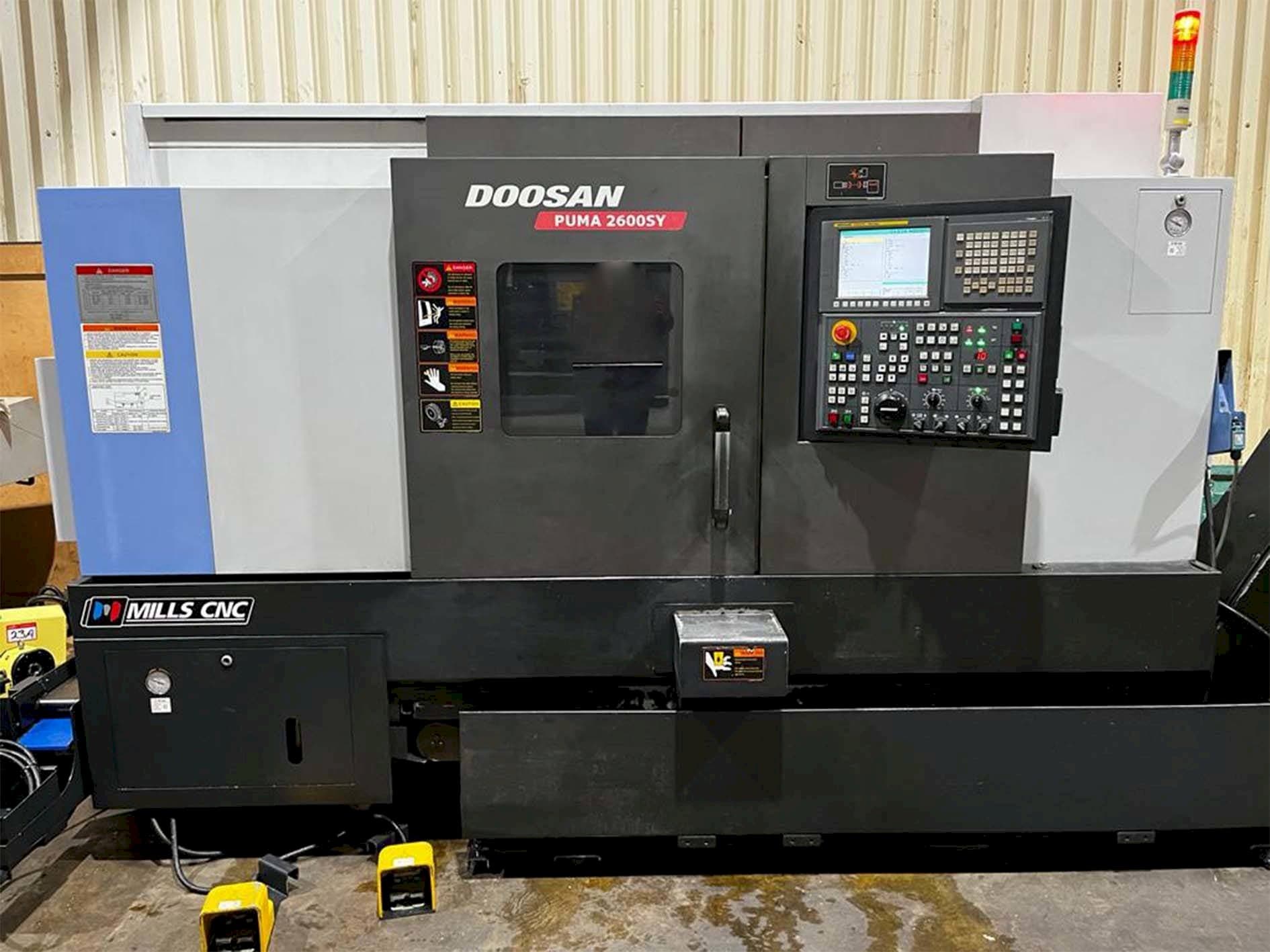 Mašīnas Doosan Puma 2600SY  pretskats