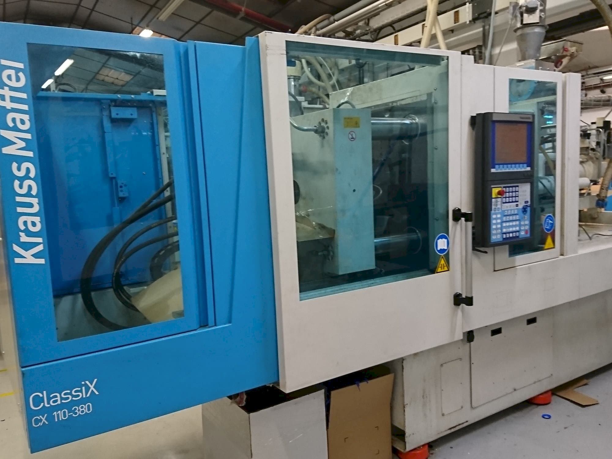 Mašīnas Krauss Maffei 110-380 CX  pretskats