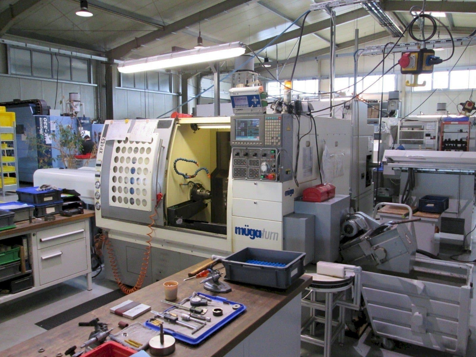 Mašīnas Muga XP4 – 42SM  pretskats