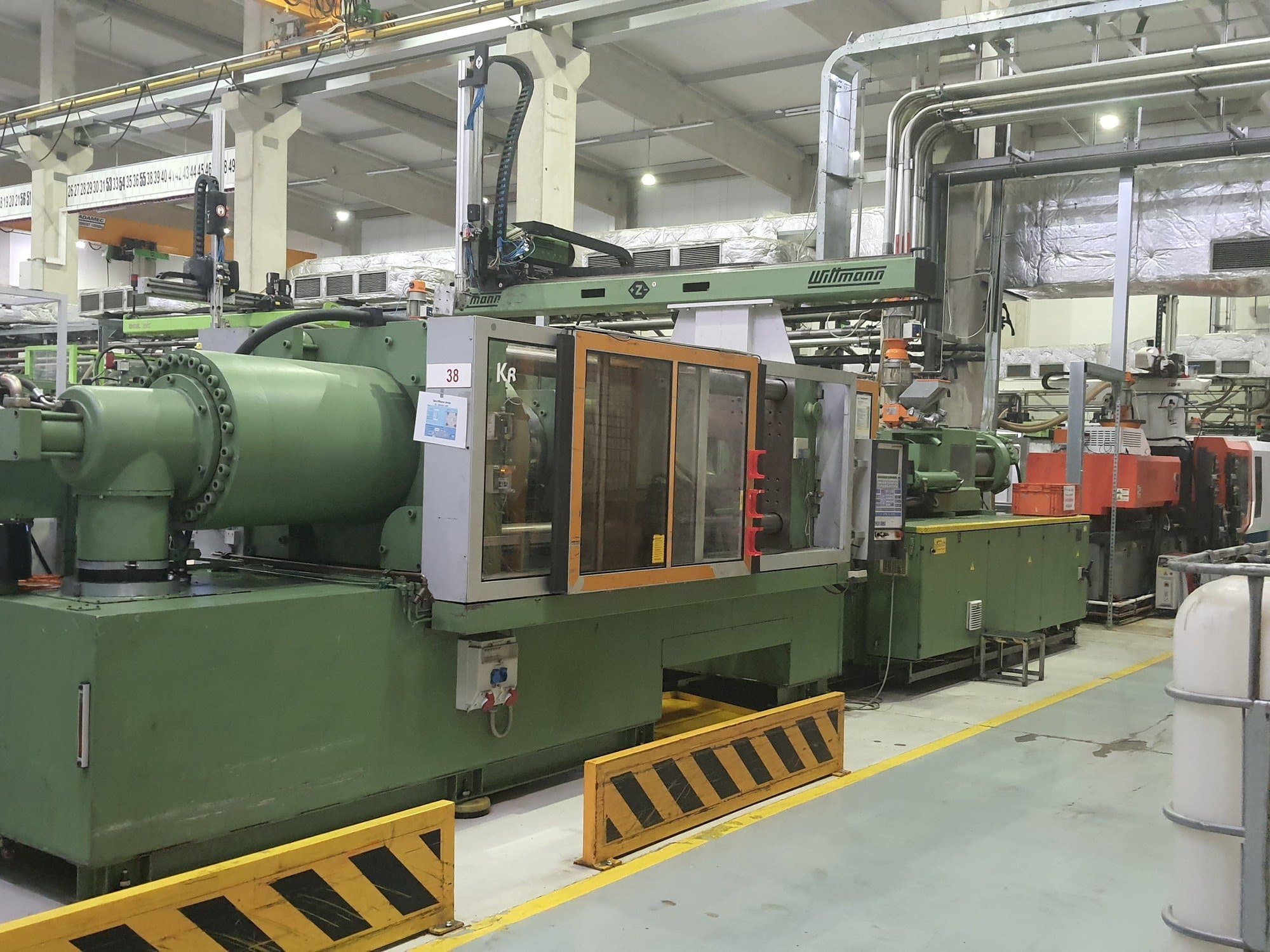 Mašīnas Krauss Maffei 420-3000  pretskats