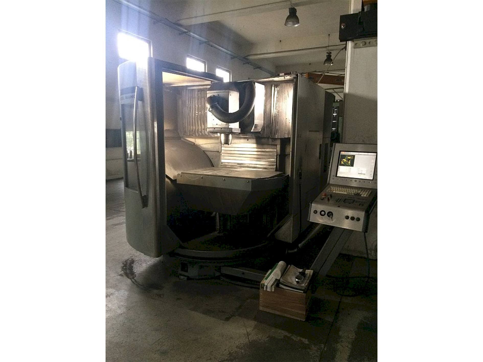 Mašīnas DMG 60T  pretskats