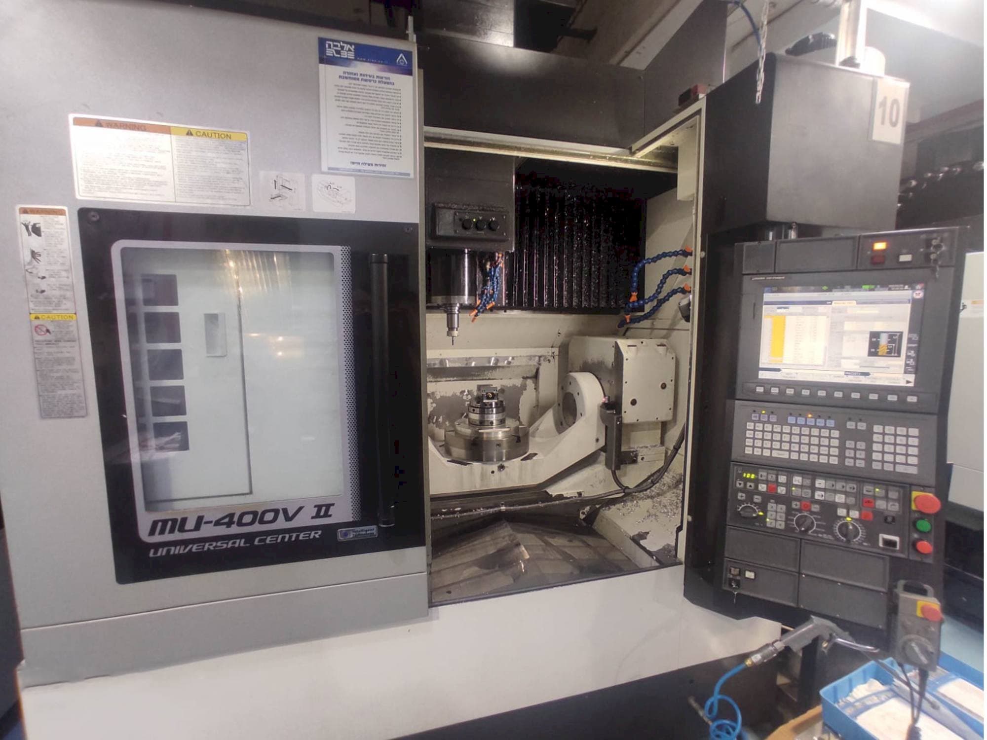 Mašīnas Okuma MU-400V-II  pretskats