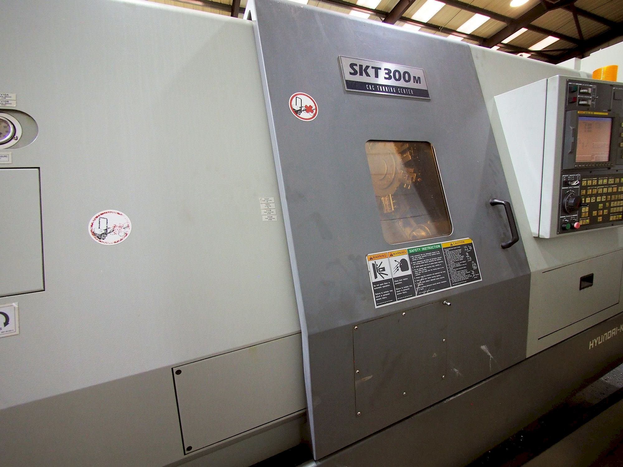 Mašīnas Hyundai Kia SKT 300M  pretskats