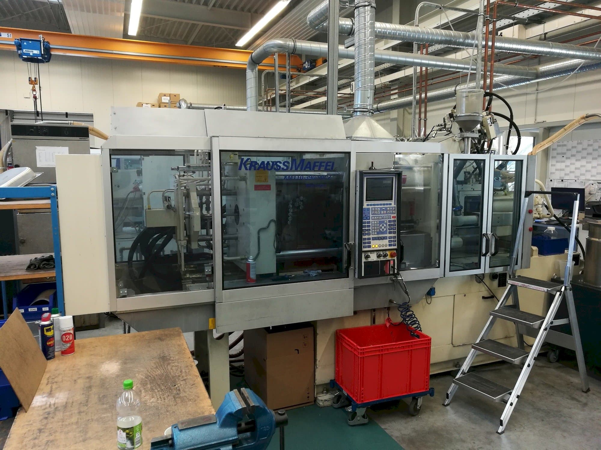 Mašīnas Krauss Maffei 110-390/90 CZ  pretskats