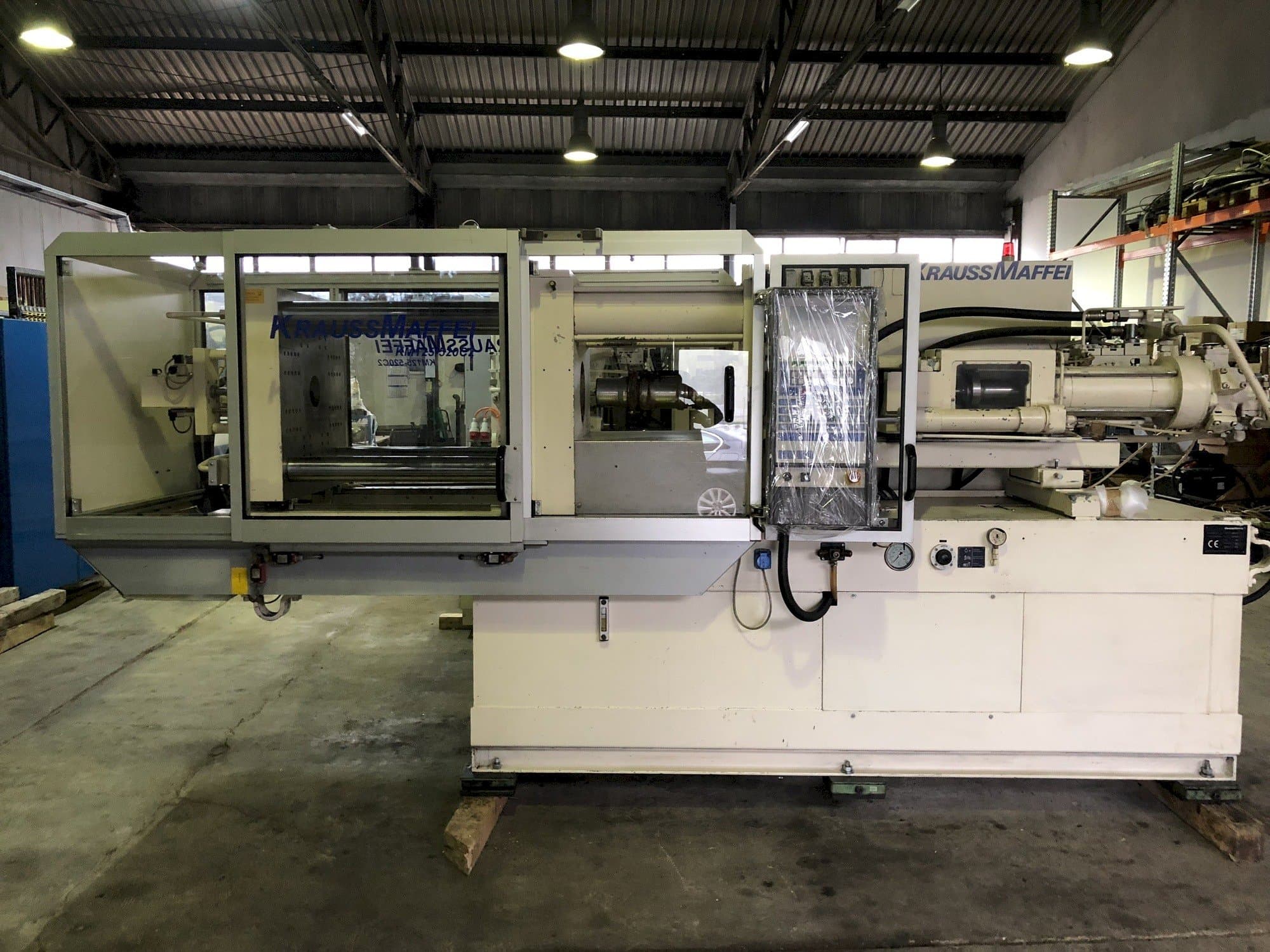 Mašīnas Krauss Maffei 125-520  pretskats