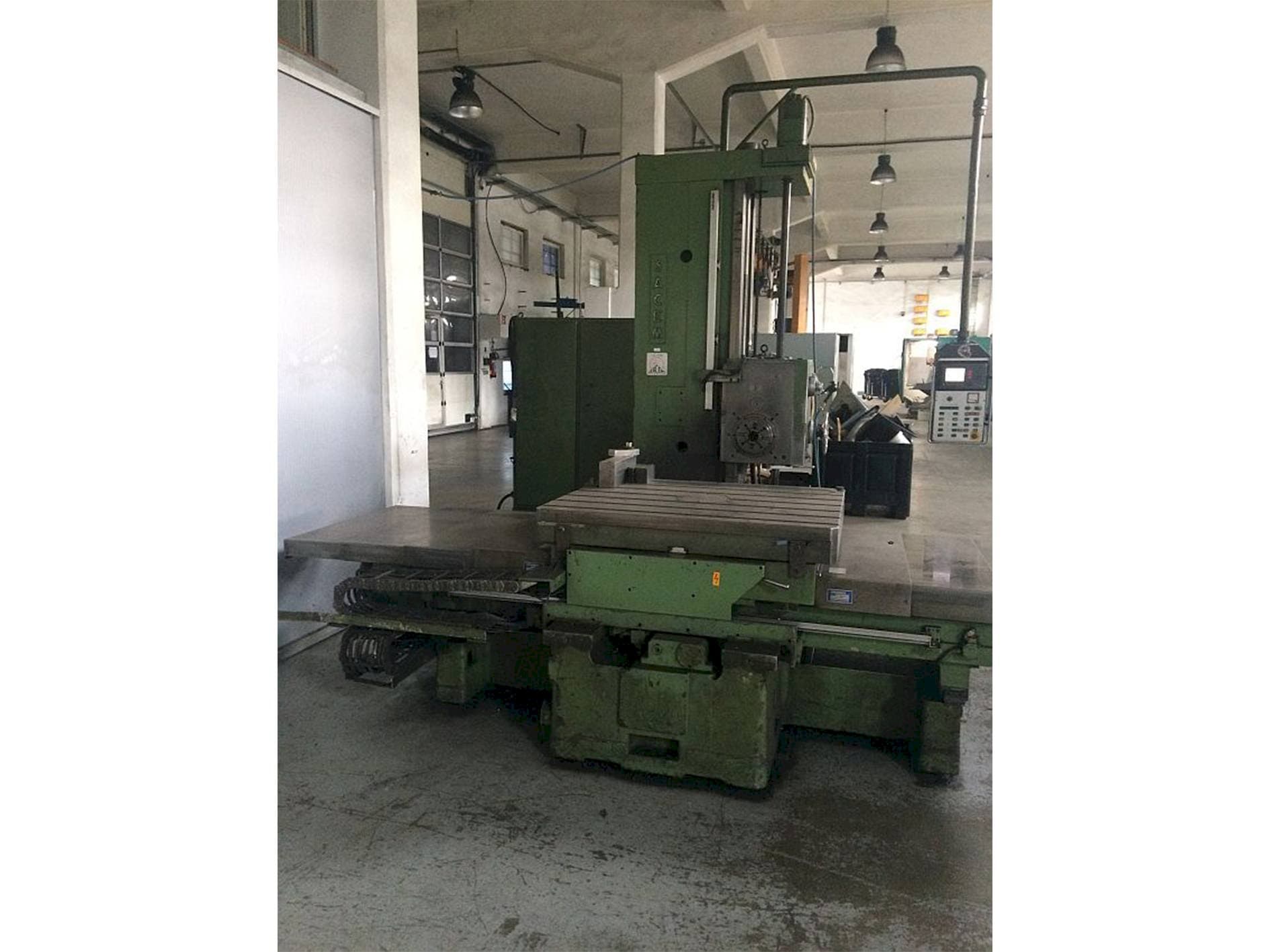 Mašīnas Sacem									 MST-XC/110 A/C  pretskats