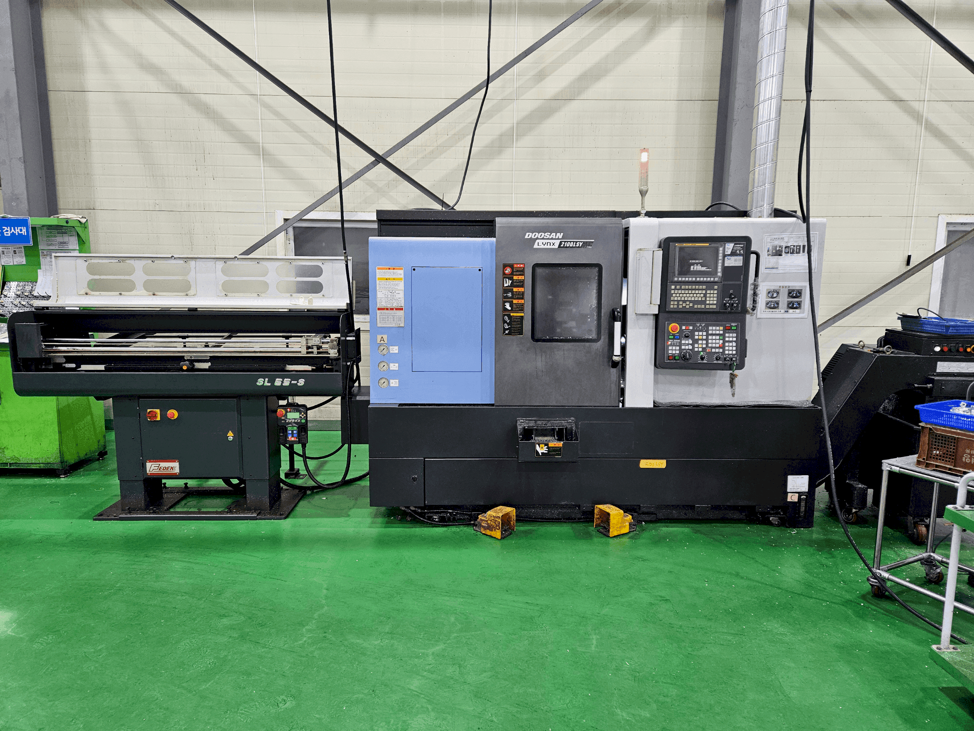 Mašīnas DOOSAN LYNX 2100 LSYB  pretskats