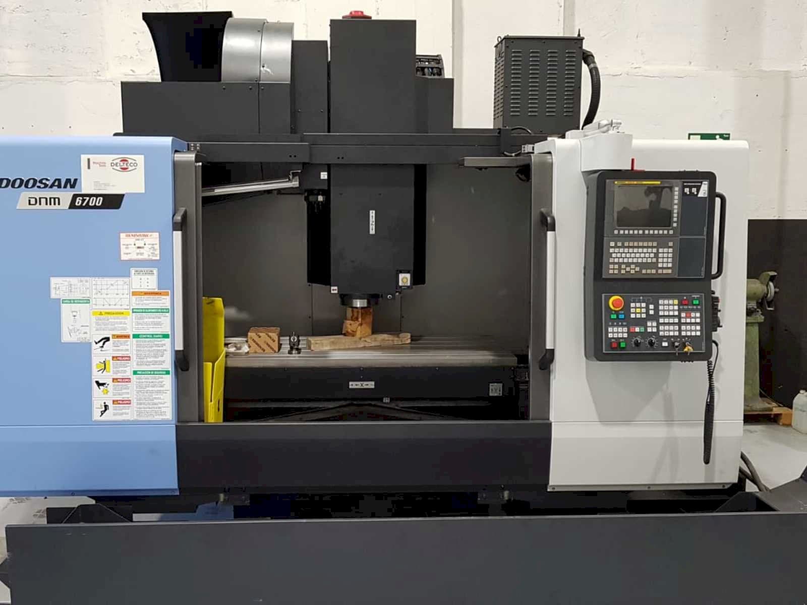 Mašīnas Doosan DNM 6700  pretskats