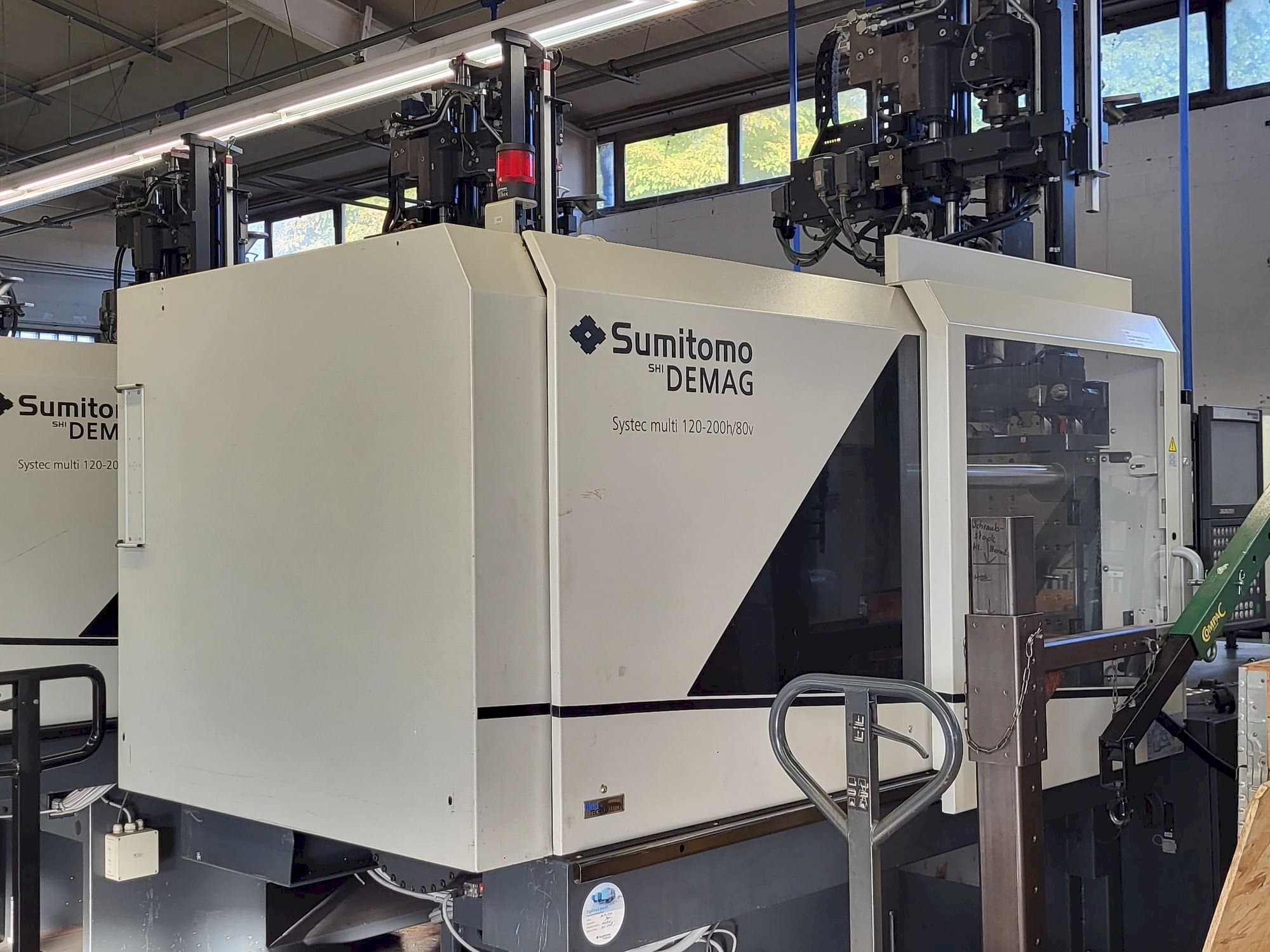 Mašīnas Sumitomo SHI DEMAG Multi 120/470-200h/80V kreisās malas  skats