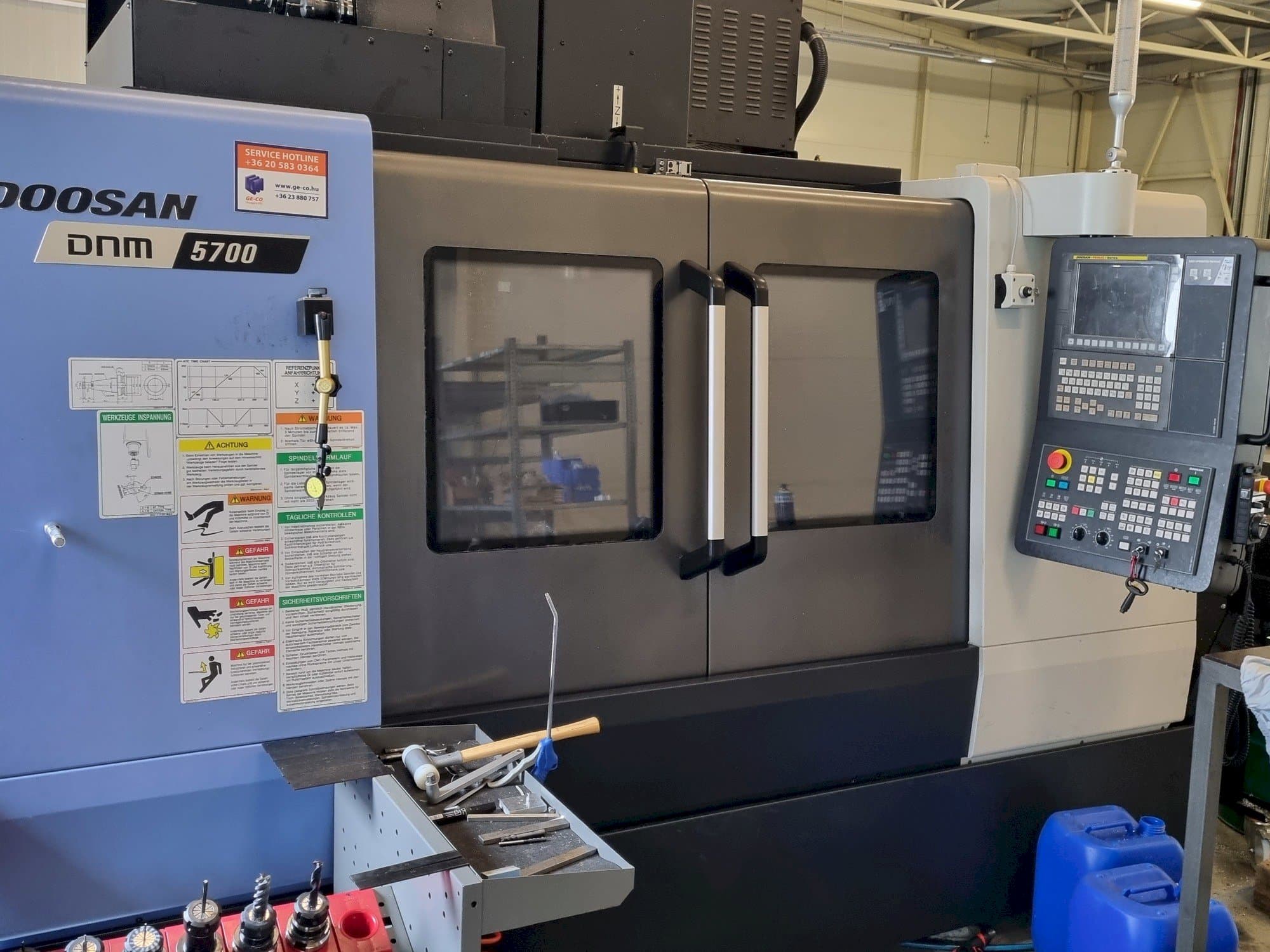 Mašīnas DOOSAN DNM 5700  pretskats