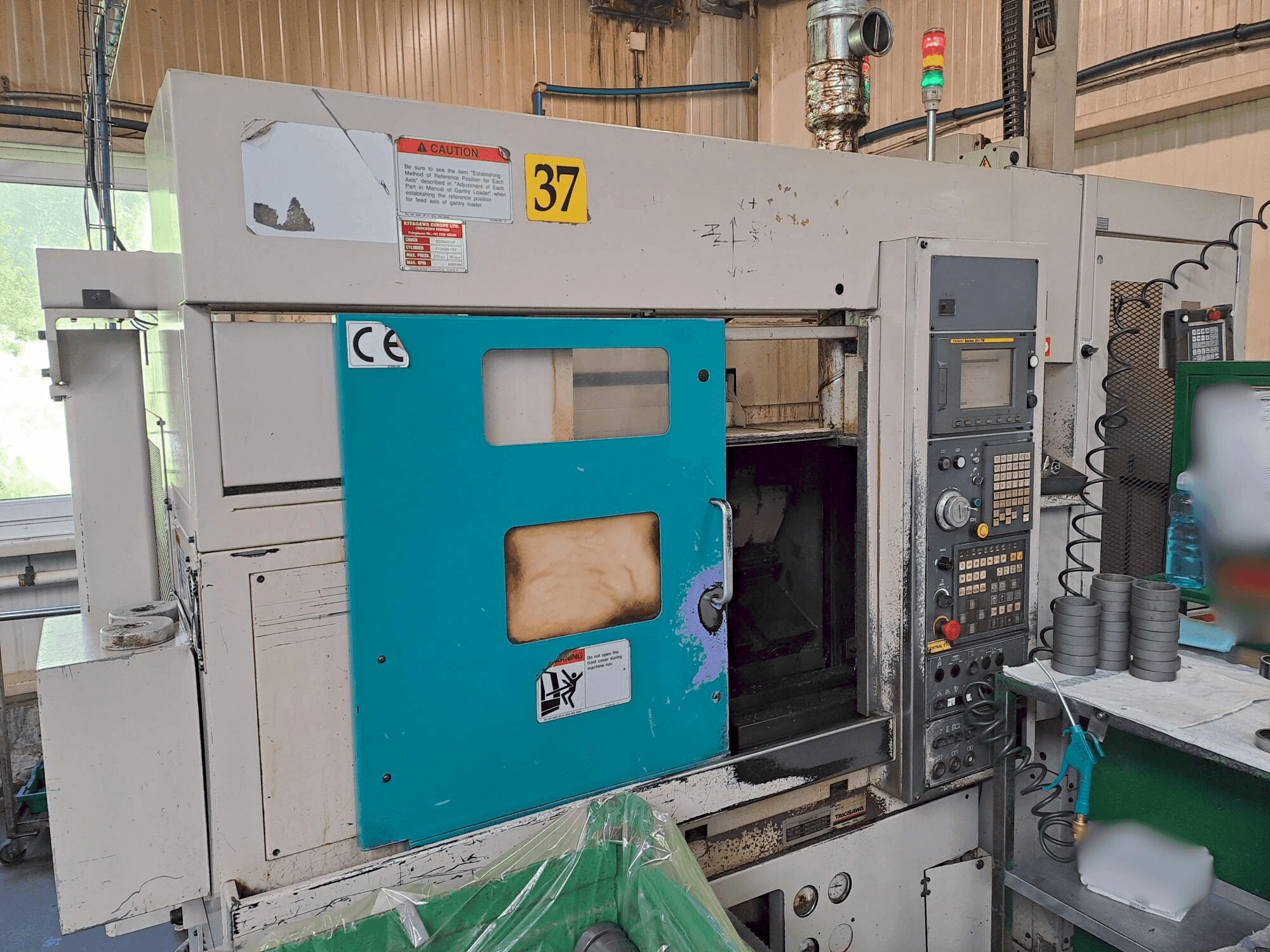 Mašīnas Takisawa TC 200  pretskats