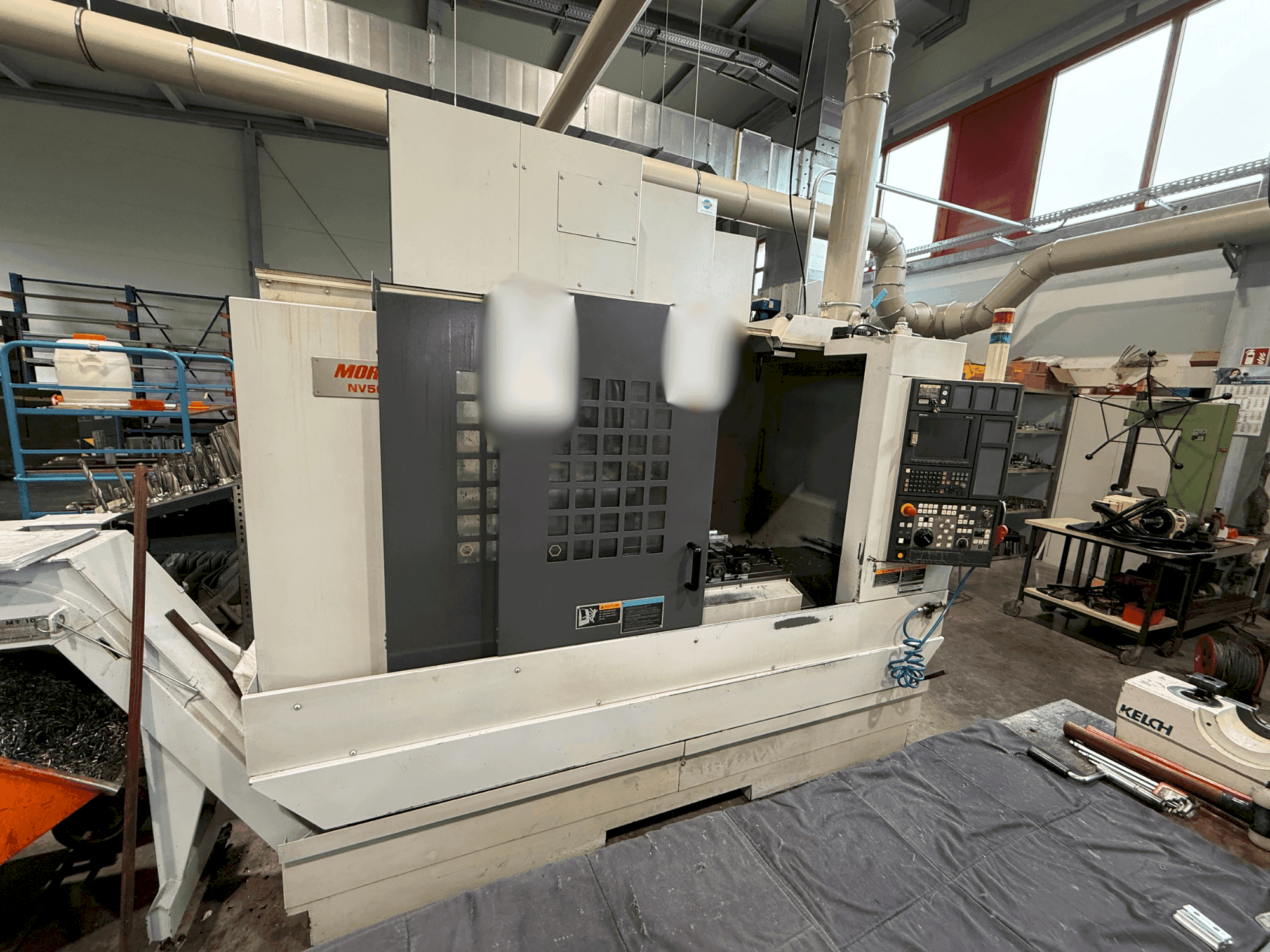 Mašīnas MORI SEIKI NV 5000 a1 B/40  pretskats