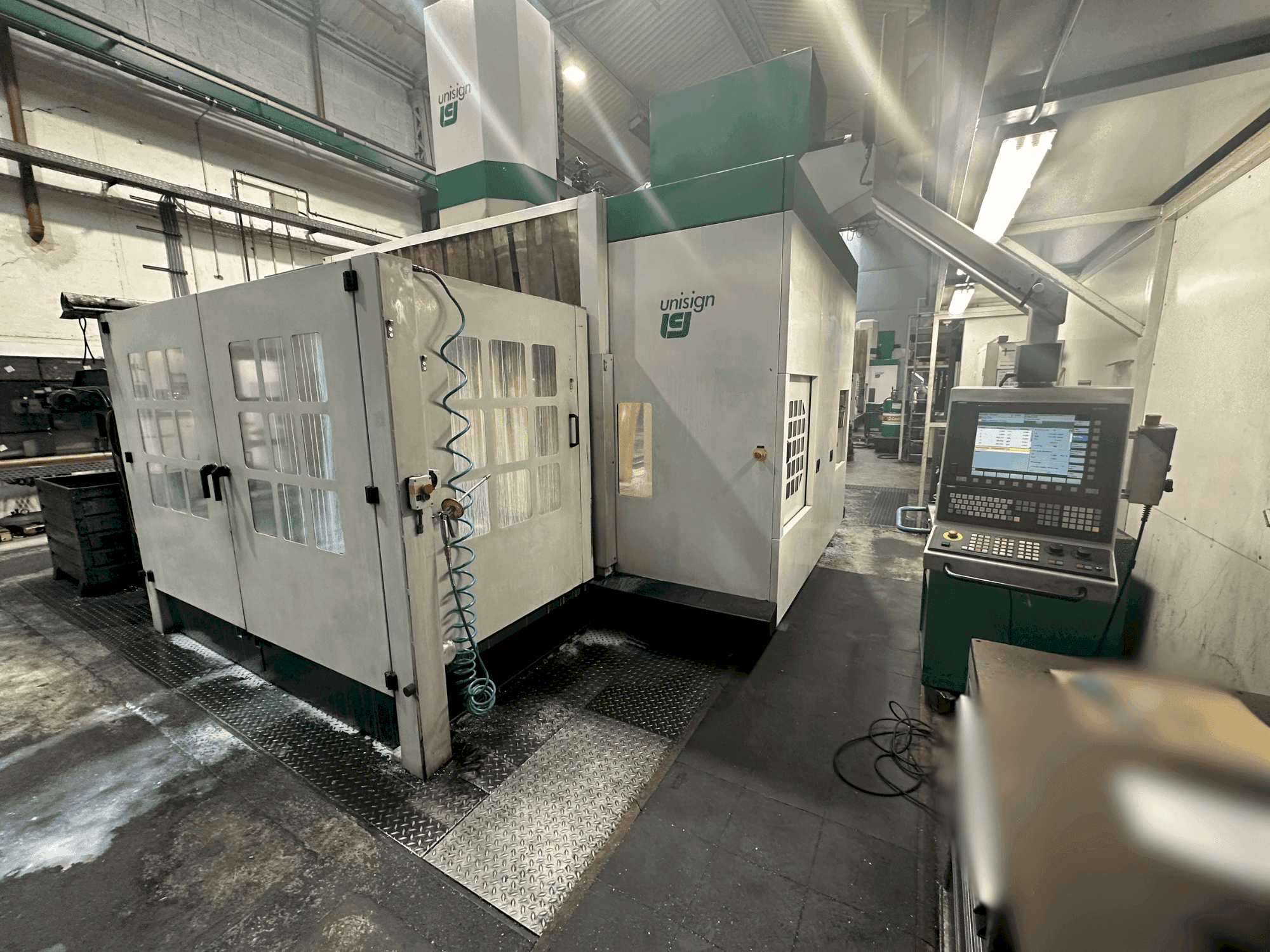 Mašīnas Unisign UNIPORT 6000  pretskats