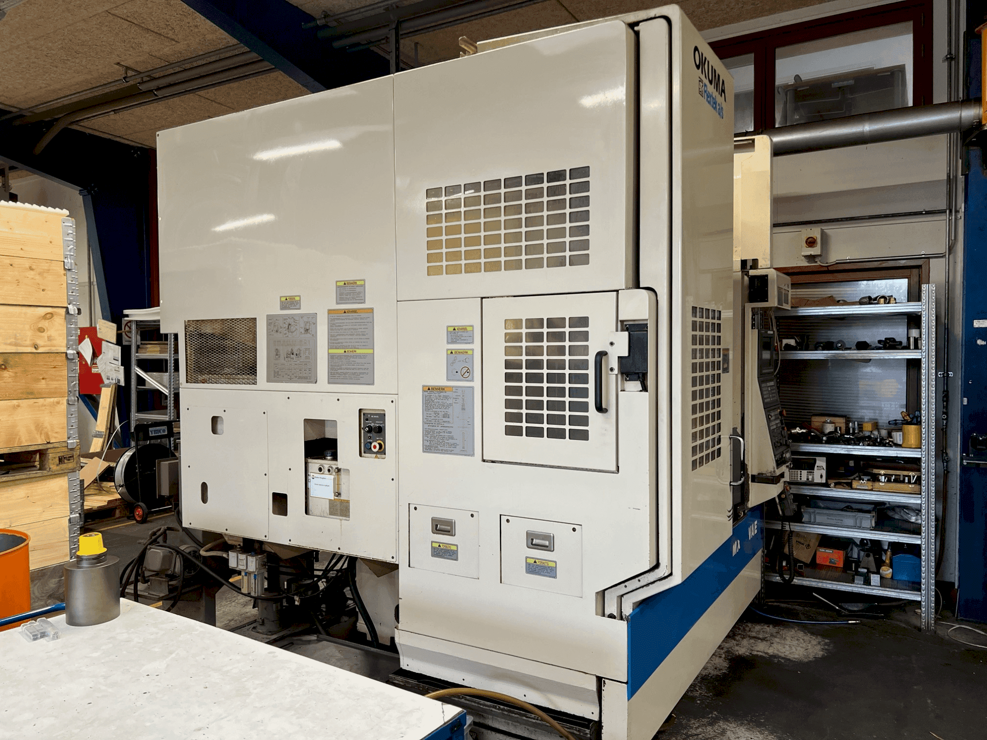 Mašīnas Okuma MX-45 VAE  pretskats