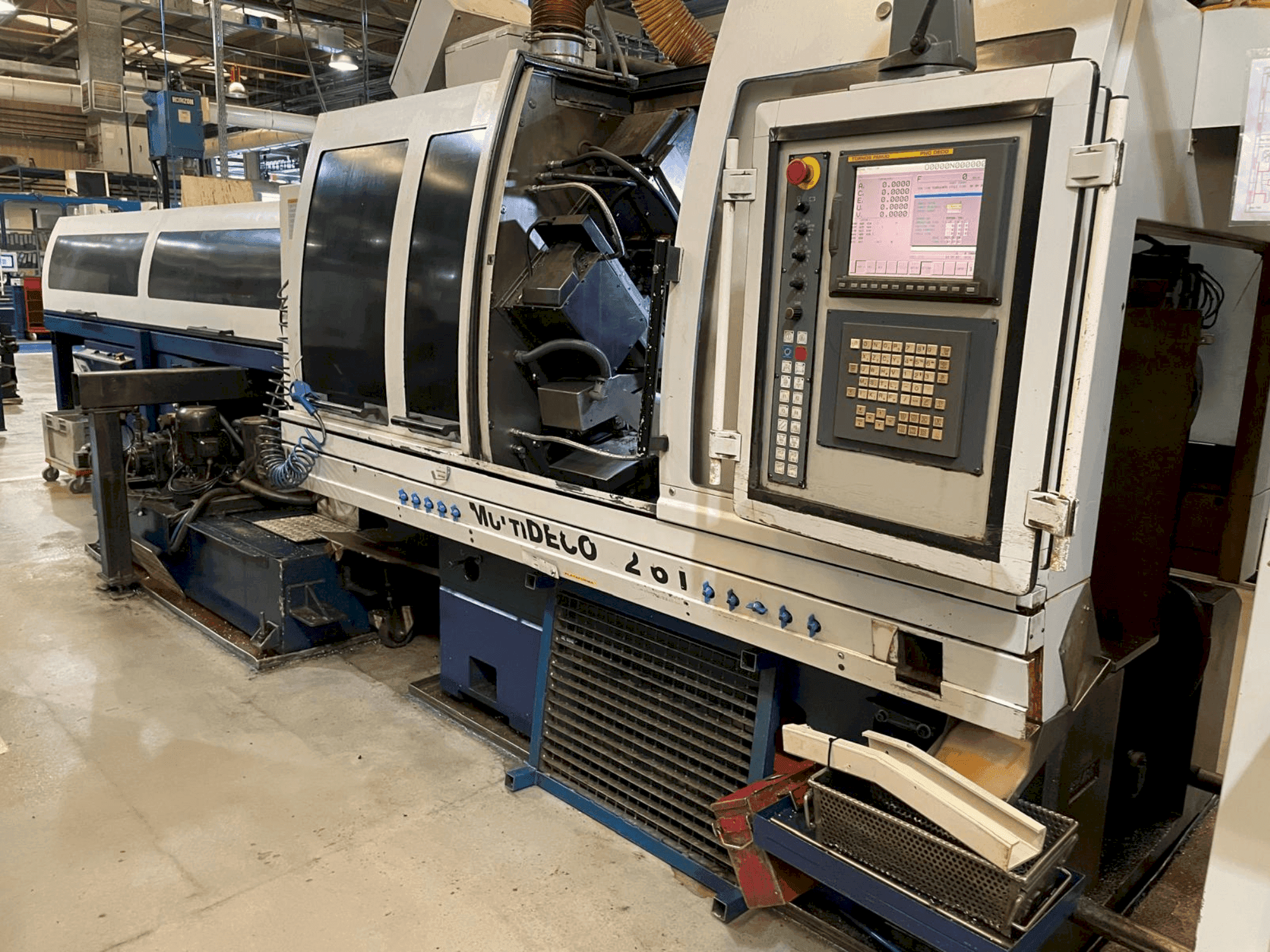 Mašīnas TORNOS MultiDeco 32-6i  pretskats