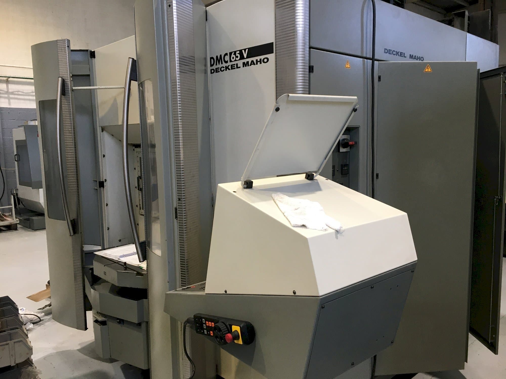 Mašīnas DECKEL MAHO DMC 65V  pretskats
