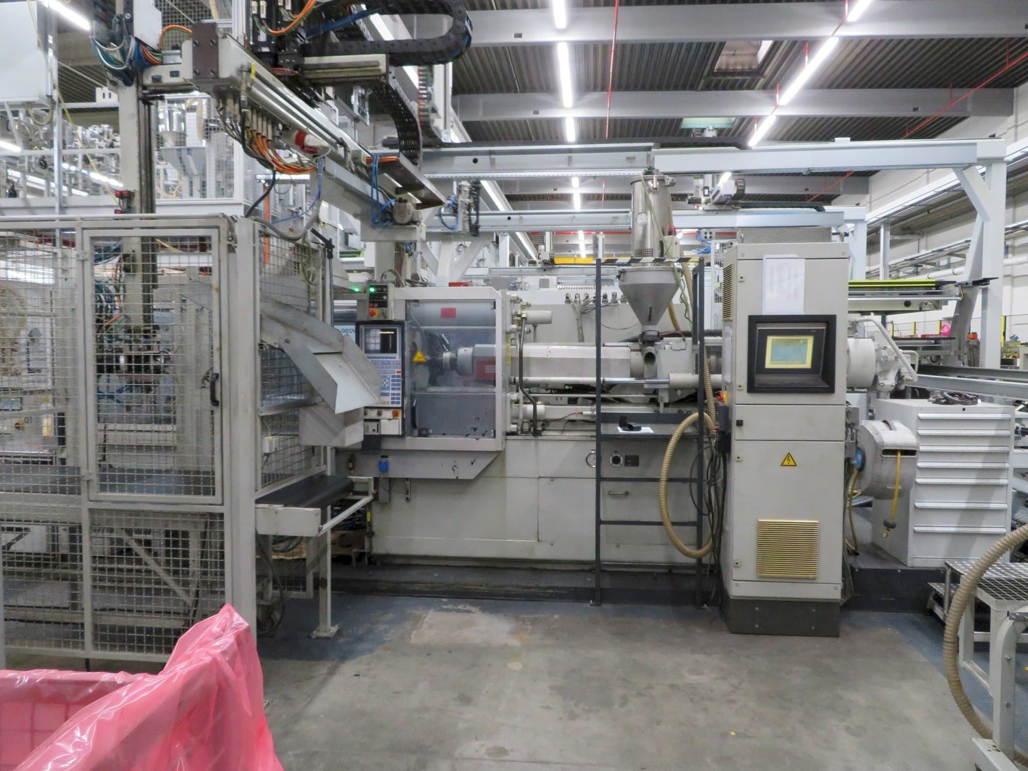 Mašīnas Krauss Maffei 200-1400 C2  pretskats