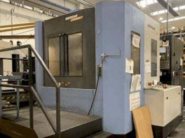 Mašīnas DOOSAN HM 6300 (2009)  pretskats