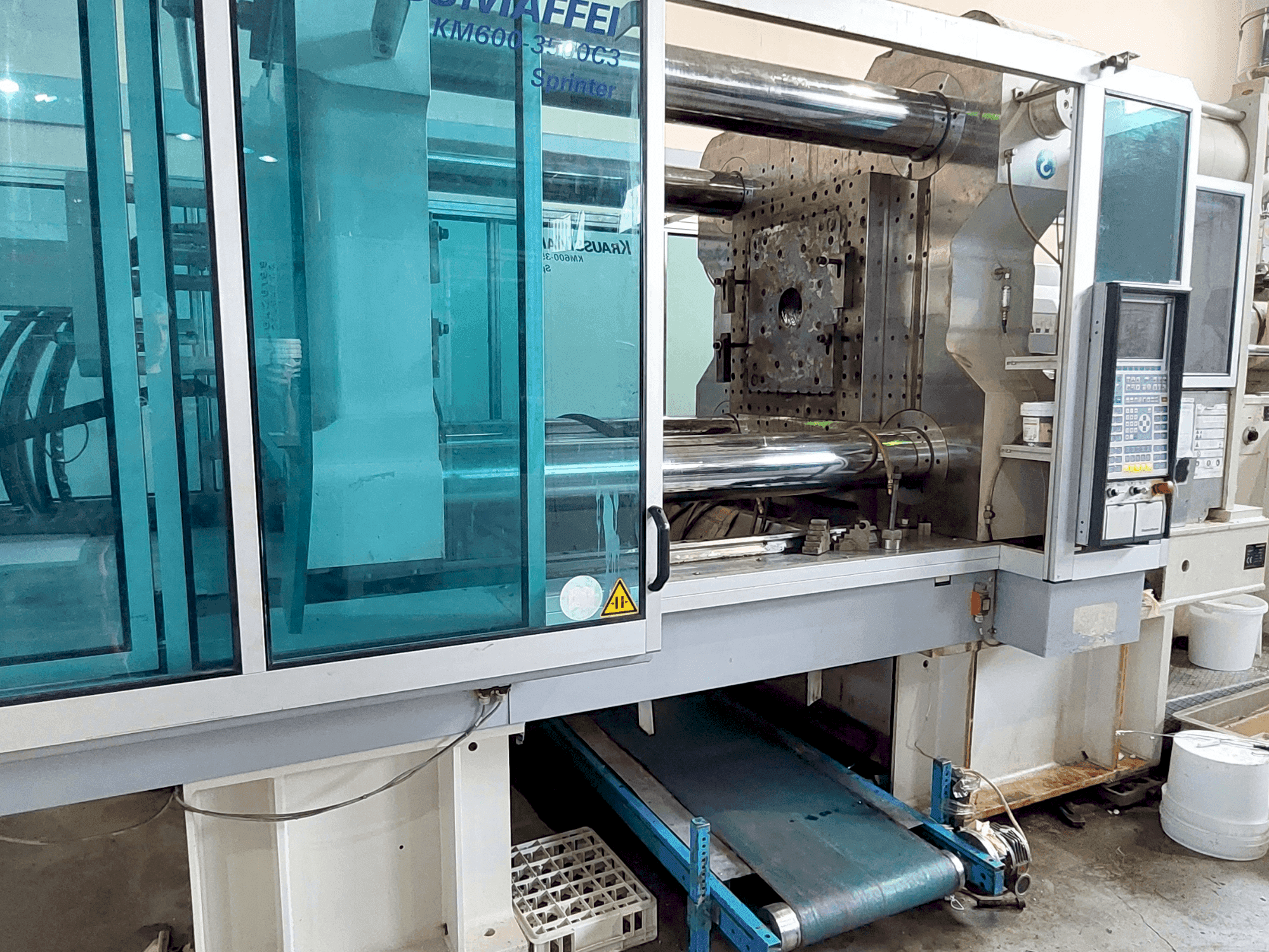 Mašīnas Krauss Maffei 600 - 3500 C3 pretskats