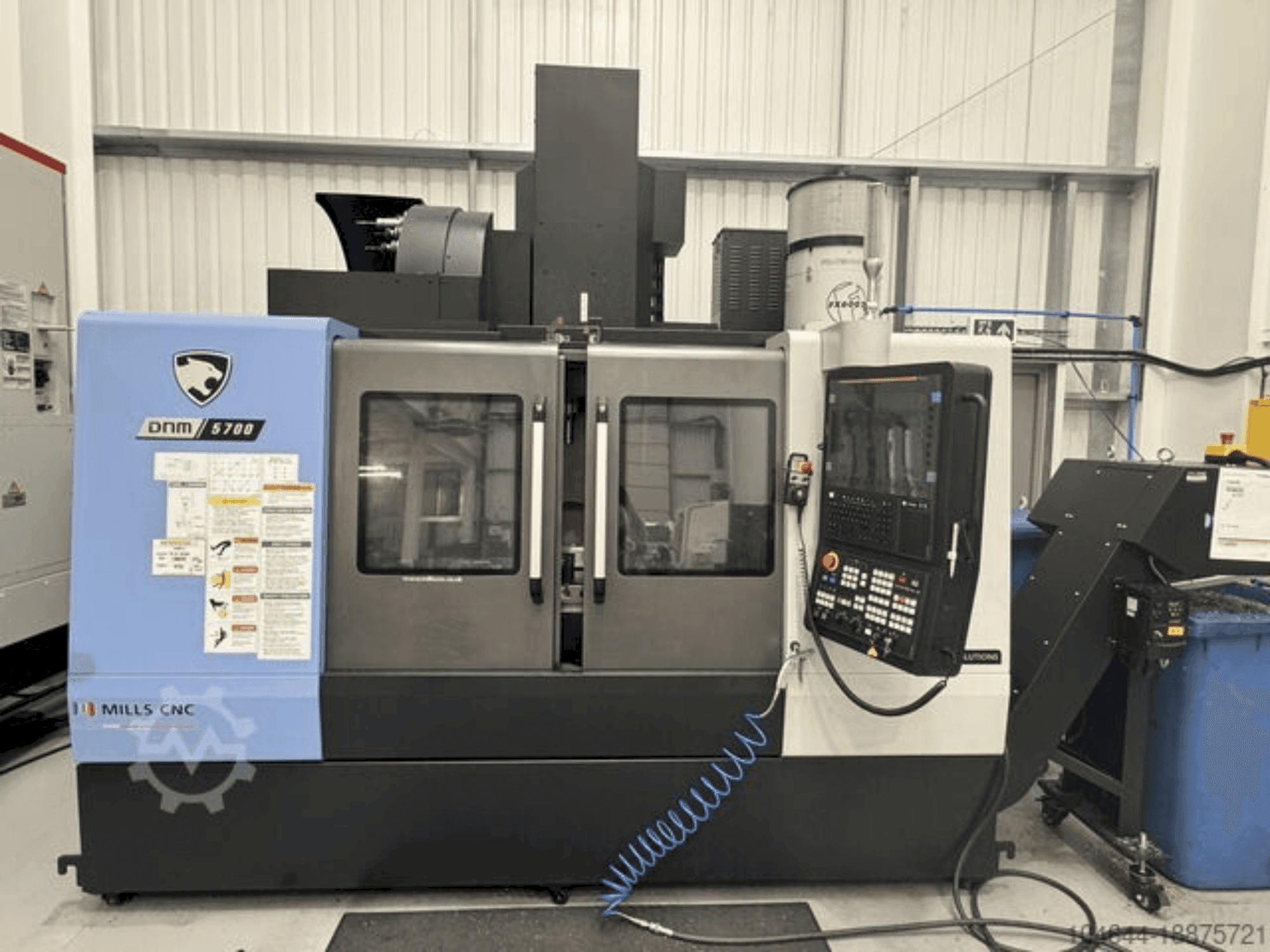 Mašīnas DOOSAN DNM 5700 pretskats