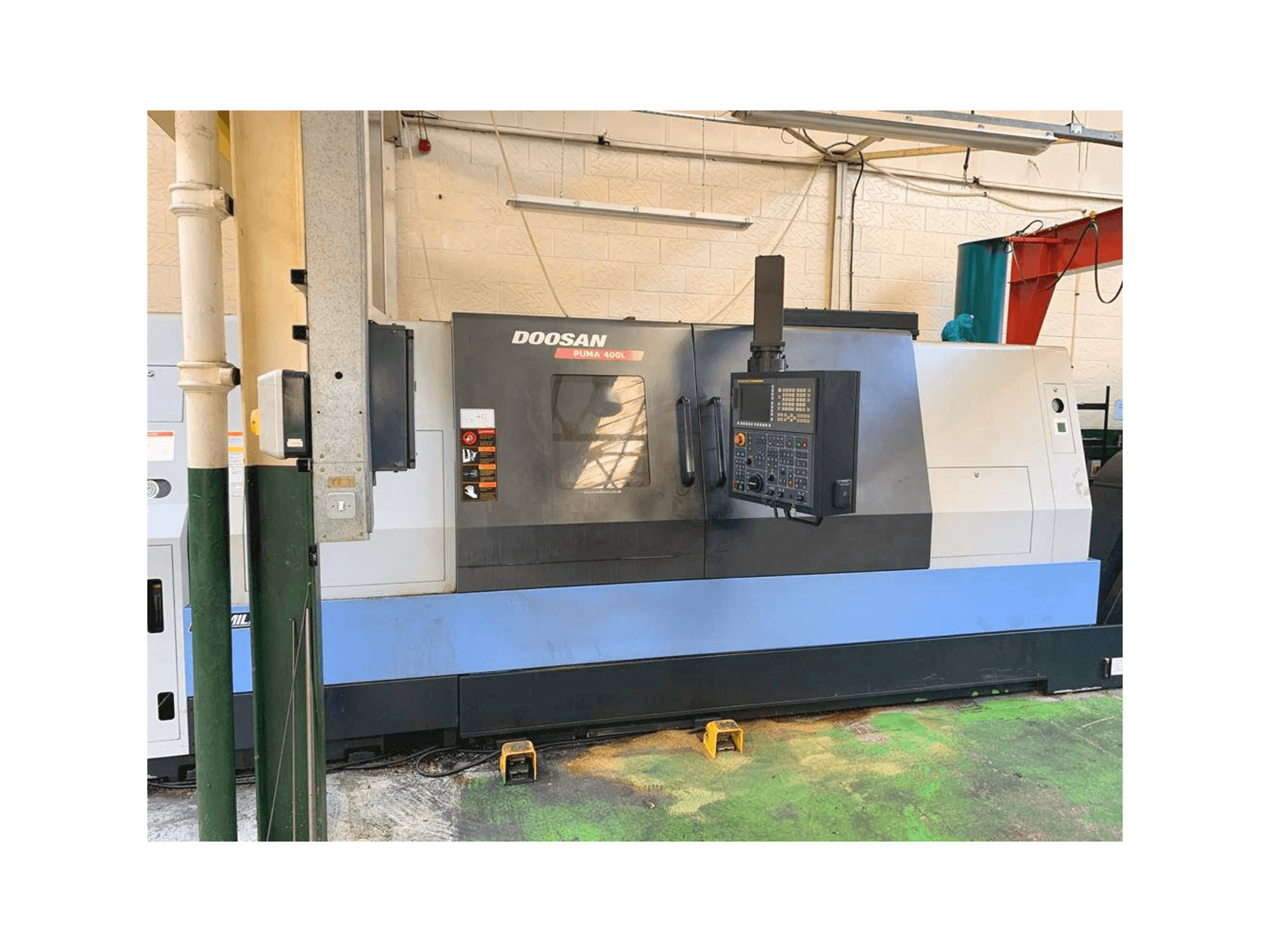 Mašīnas Doosan Puma 400LB pretskats