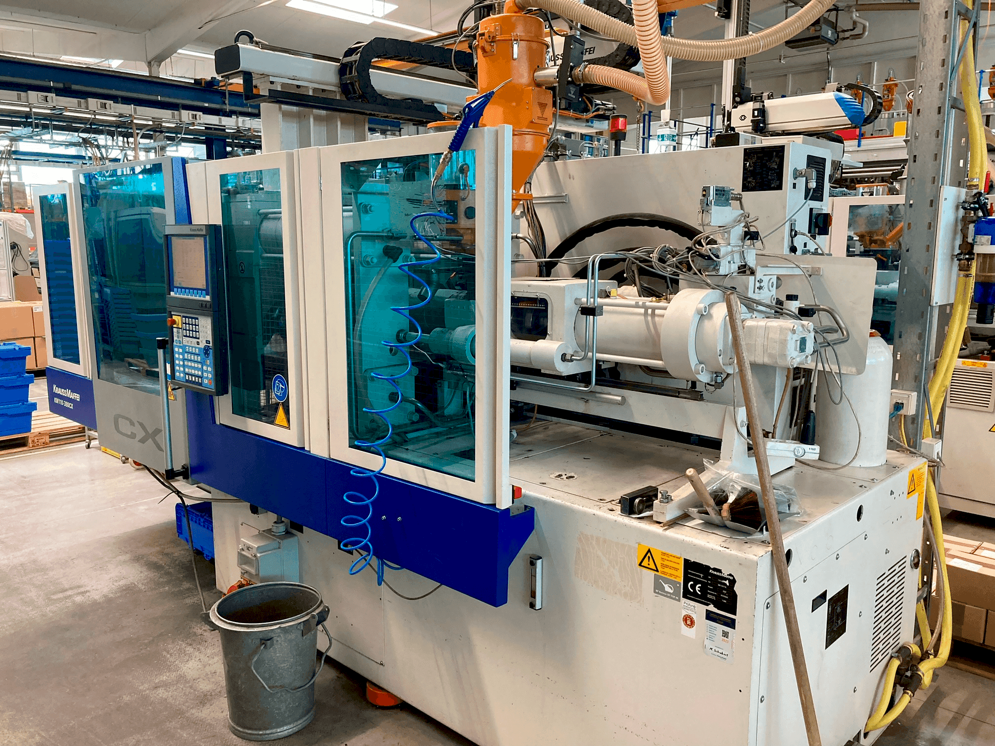 Mašīnas Krauss Maffei 110–380 CX pretskats