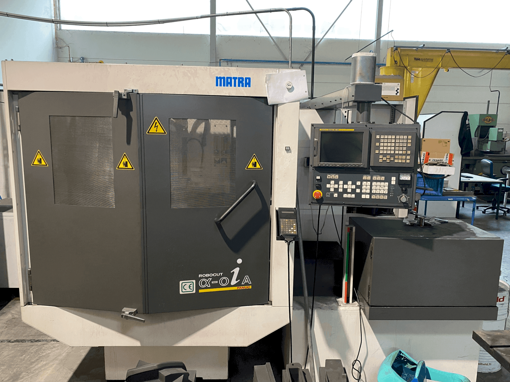 Mašīnas FANUC ROBOCUT α-0iA pretskats