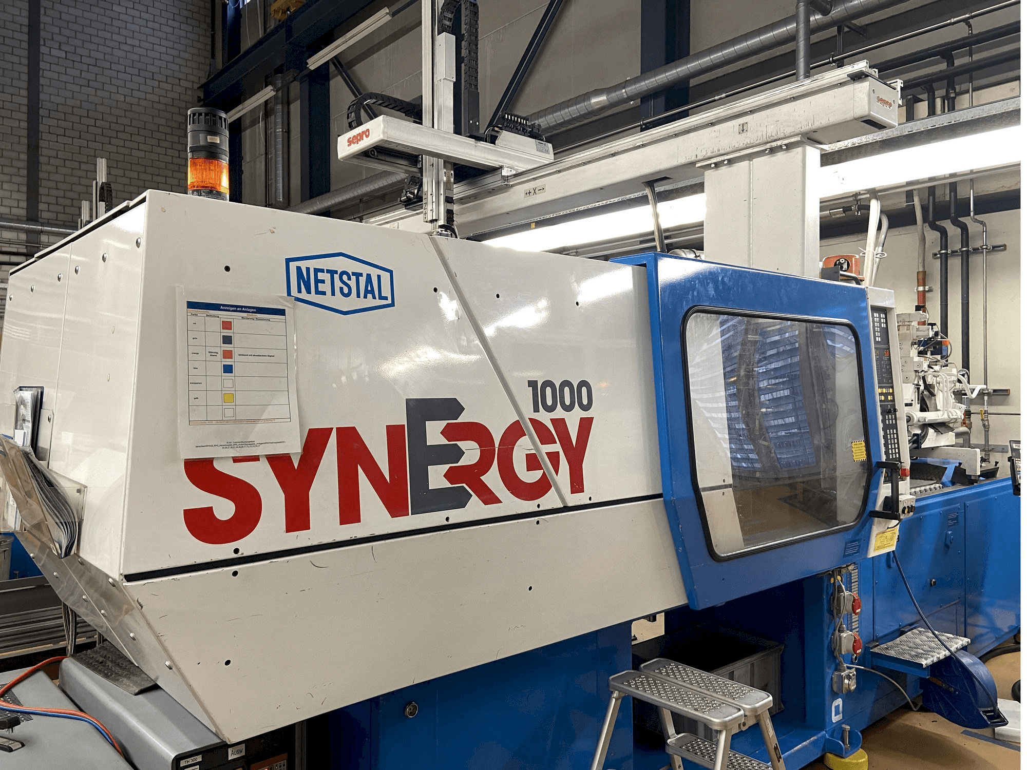 Mašīnas Netstal SYNERGY 1000-230 pretskats