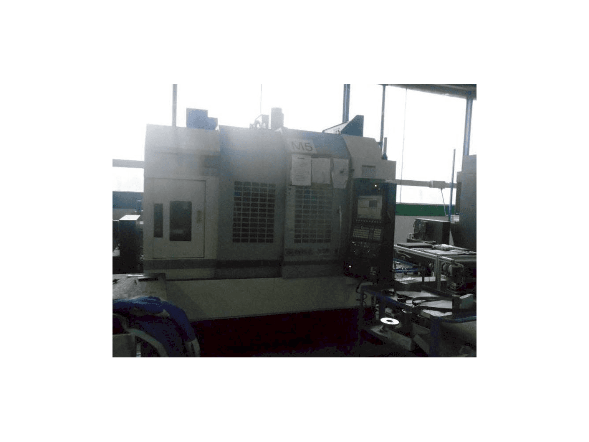 Mašīnas Okuma GENOS M560R-V pretskats