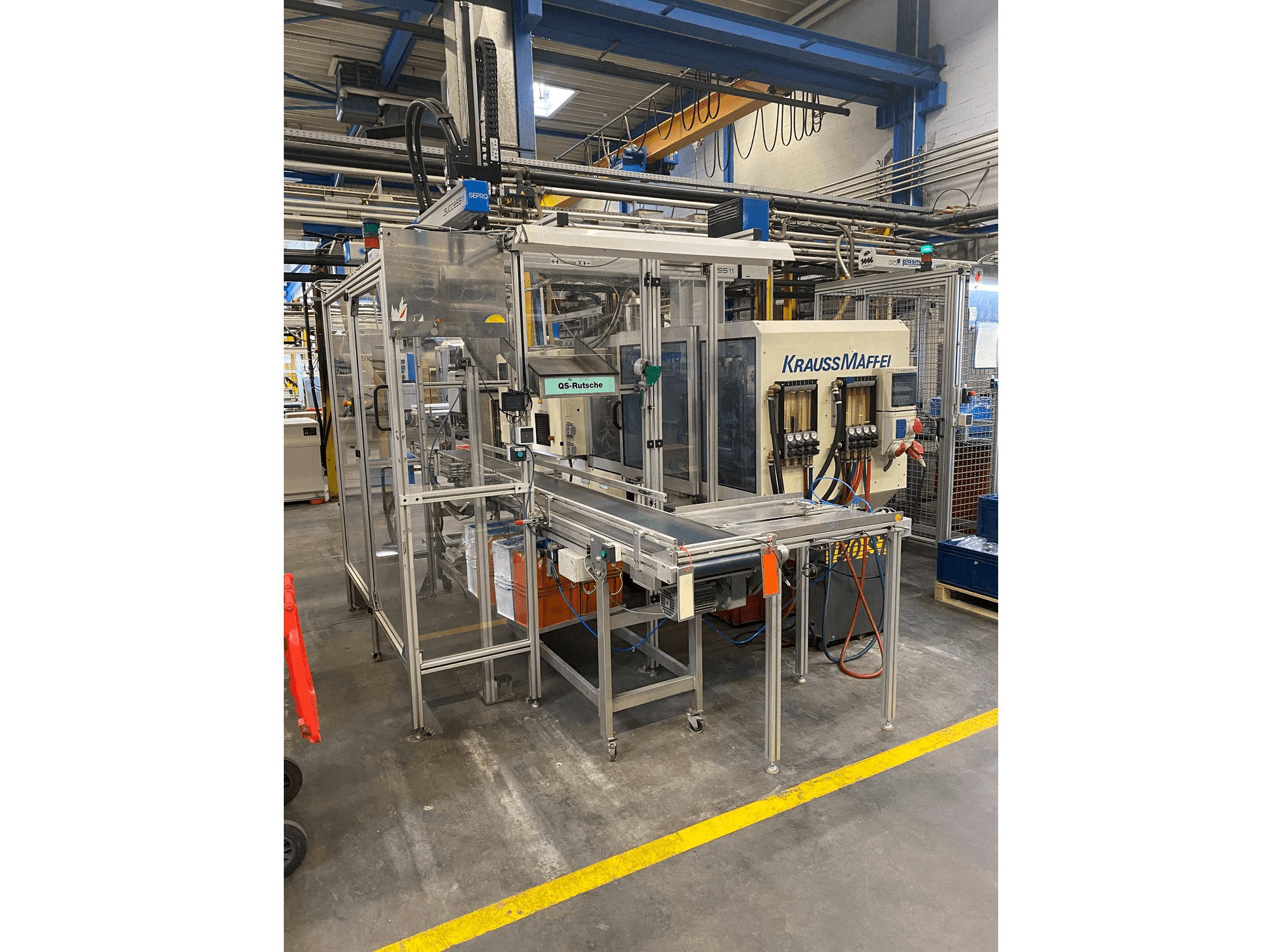 Mašīnas Krauss Maffei 80-390 C2 pretskats