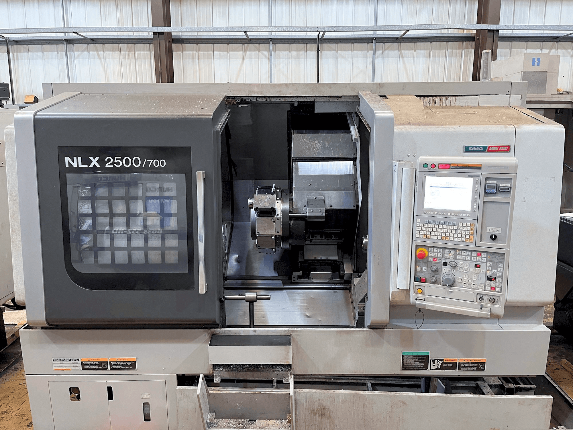 Mašīnas MORI SEIKI NLX2500Y-700 pretskats