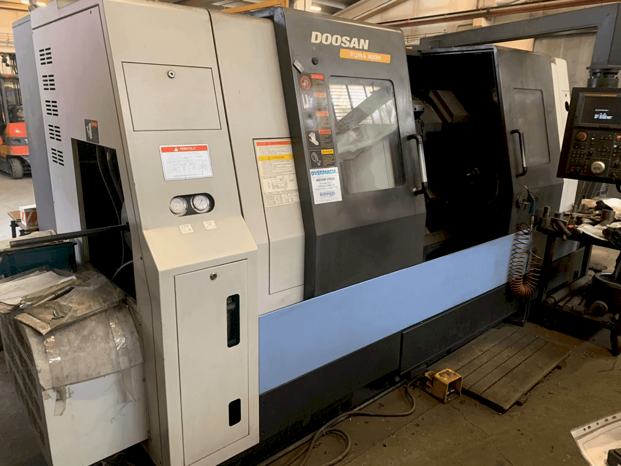 Mašīnas DOOSAN PUMA 400M pretskats