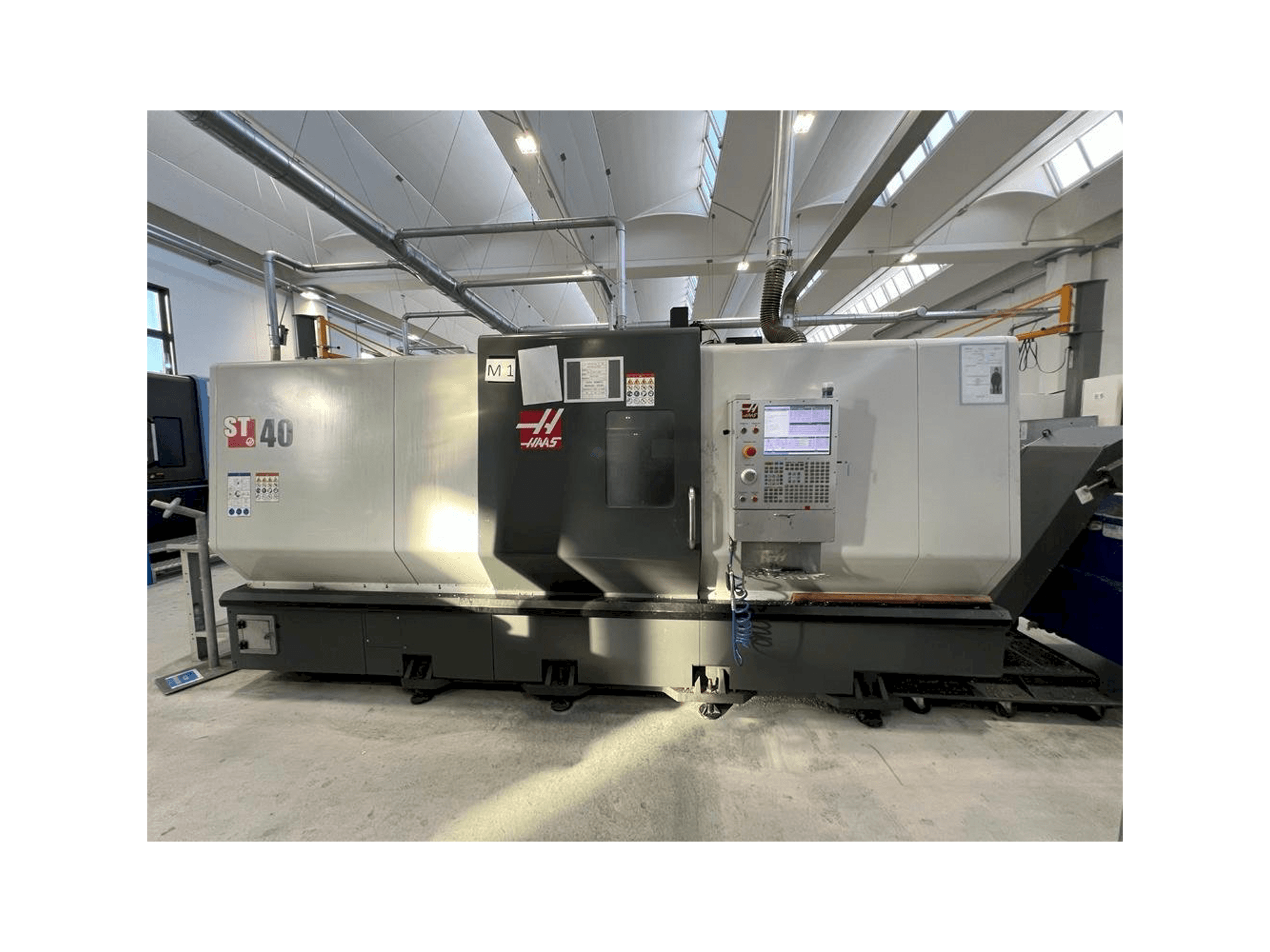 Mašīnas HAAS ST-40 pretskats