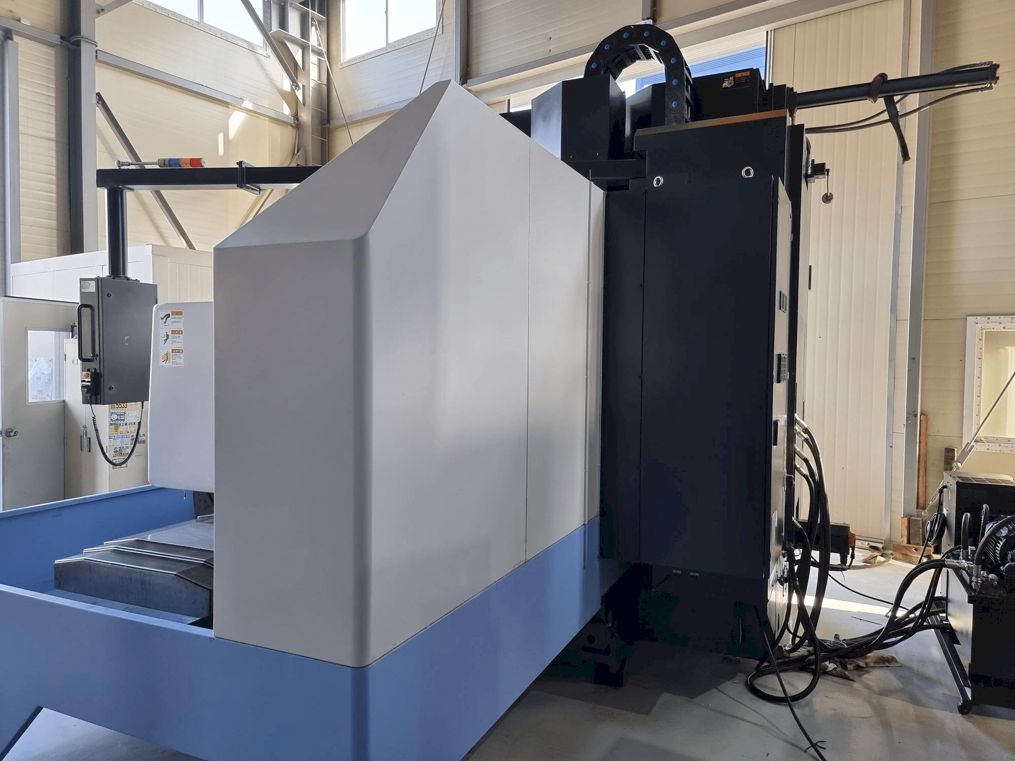 Mašīnas Doosan VM 960L skats no kreisās puses