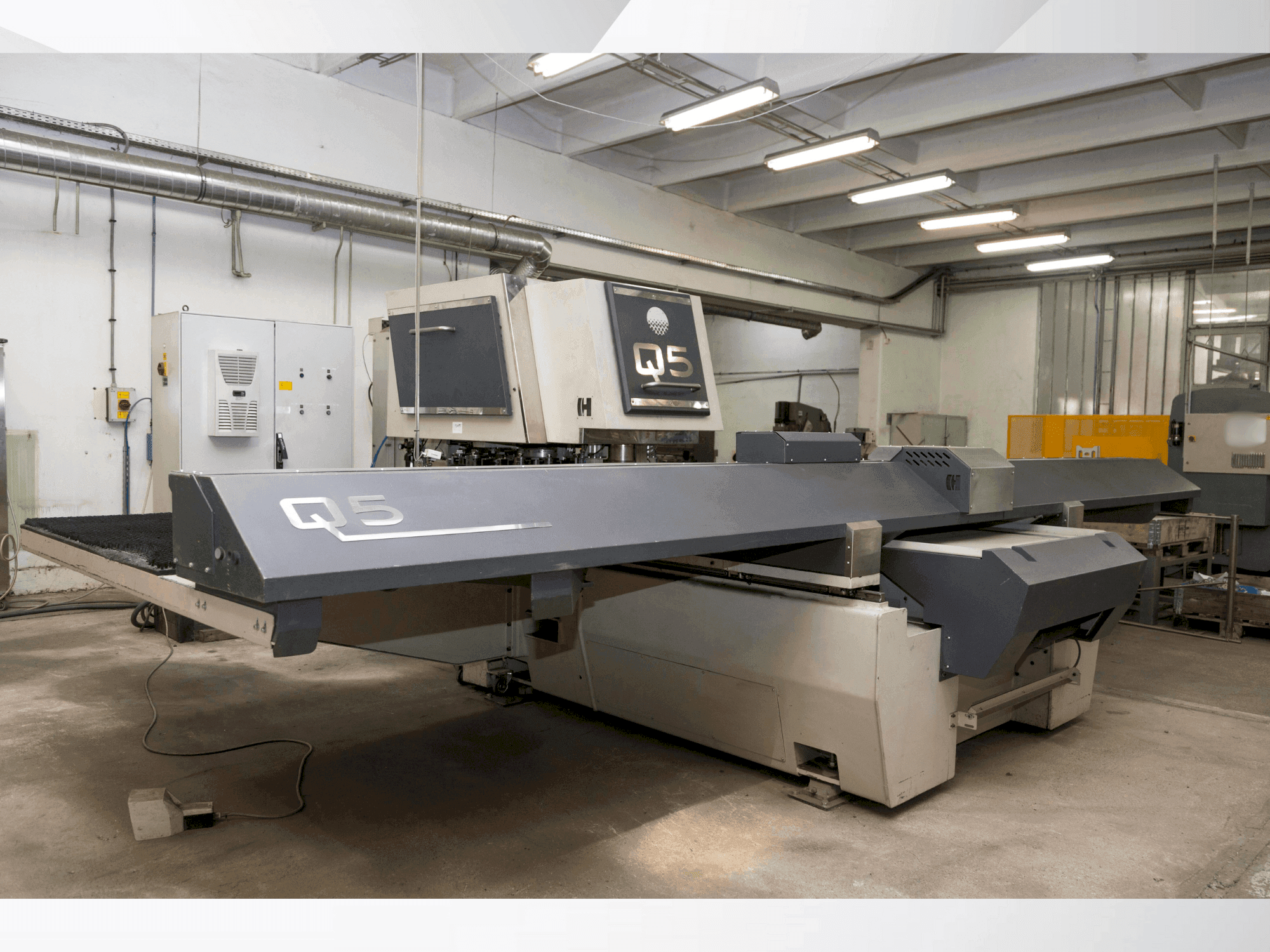 Mašīnas Tecnology HACO Q5 (2014) kreisās malas skats